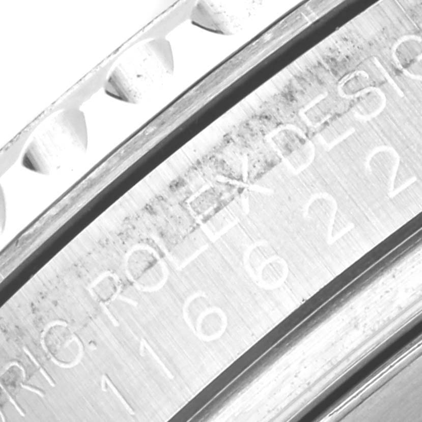 This image shows a close-up of the engraved serial number on the Rolex Yacht-Master 116622 Men's Stainless Steel Blue Dial 116622 Men's Stainless Steel Blue Dial's case.
