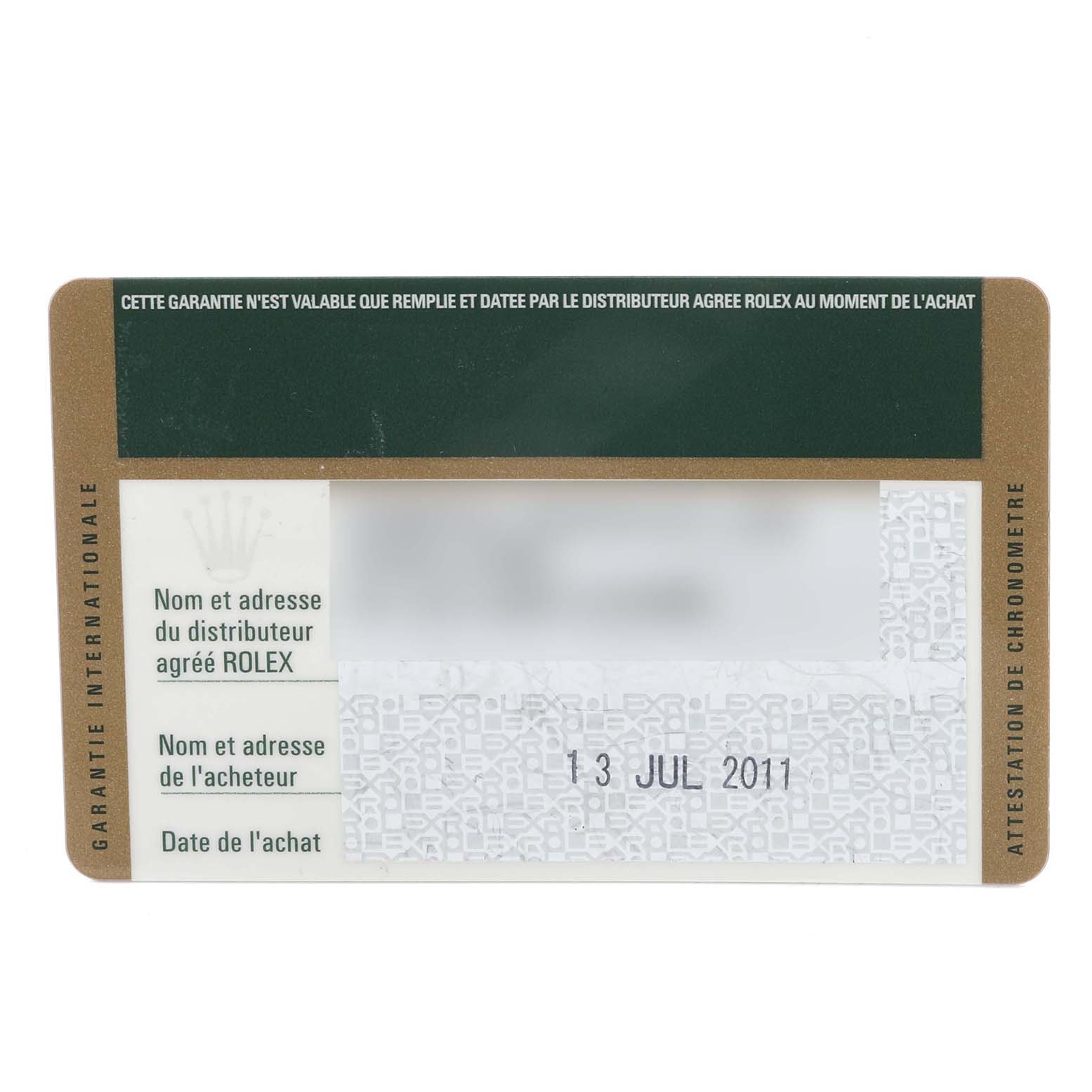 The image shows a warranty card for the Rolex Yacht-Master 16623 Men's Steel and Gold (two tone) White Dial, displaying details like dealer and purchase date.