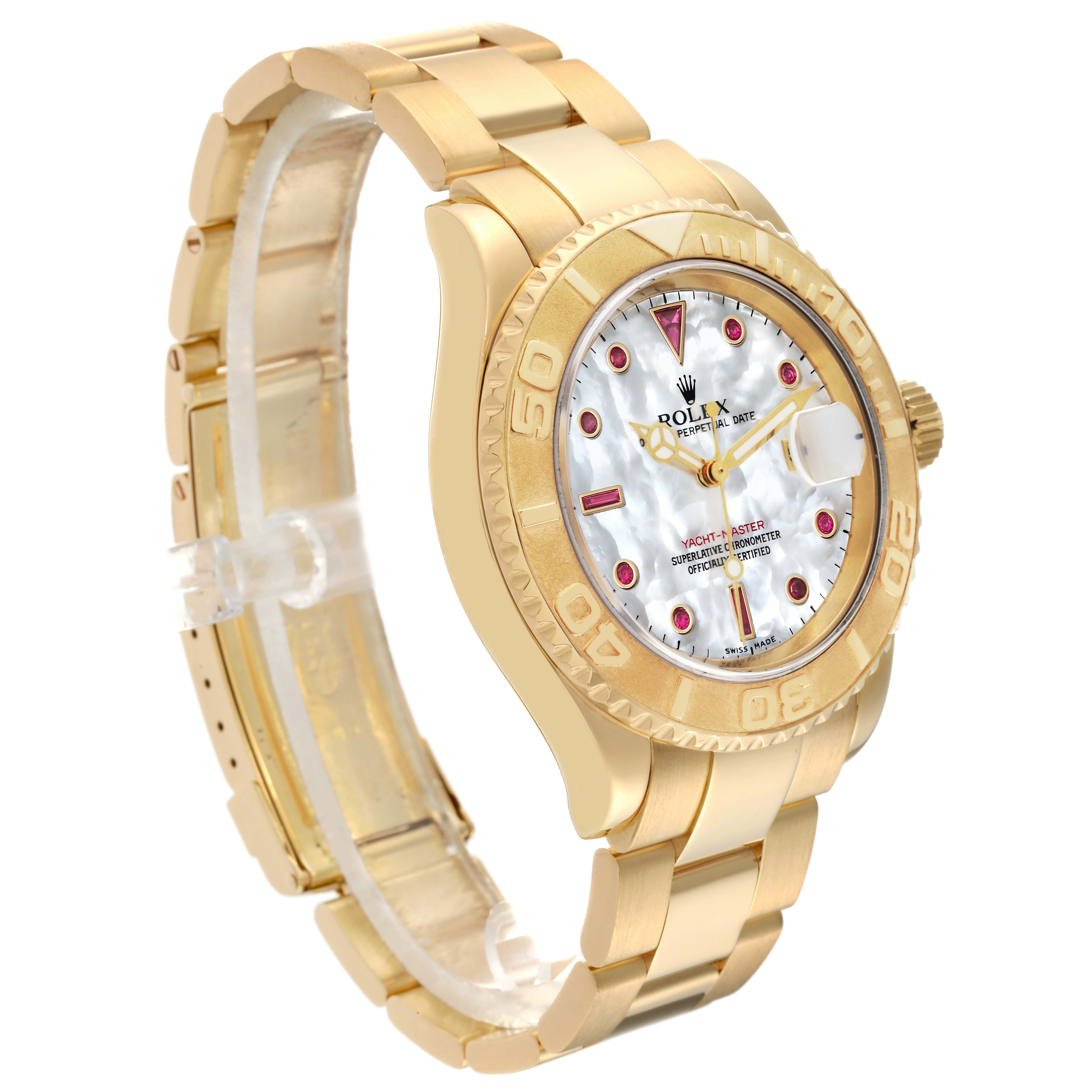 The Rolex Yacht-Master 16628 Men's Yellow Gold Mother of Pearl Dial 16628 Men's Yellow Gold Mother of Pearl Dial watch is shown from an angle that highlights the gold bracelet, bezel, and mother-of-pearl dial.