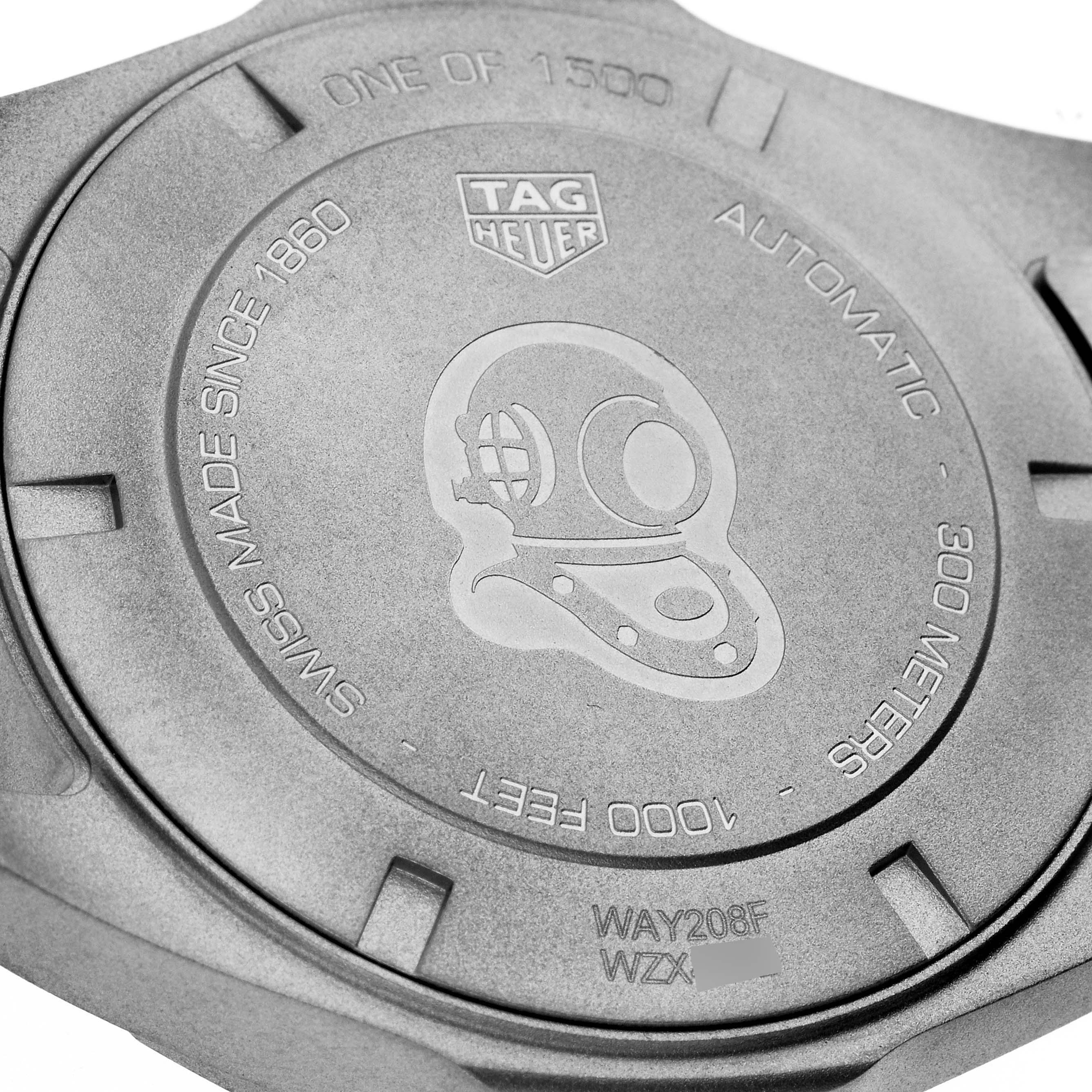 The image shows the back of a Tag Heuer Aquaracer WAY208F.BF0638 Men's Titanium Black Dial WAY208F.BF0638 Men's Titanium Black Dial watch, displaying the model details and water resistance engraving.