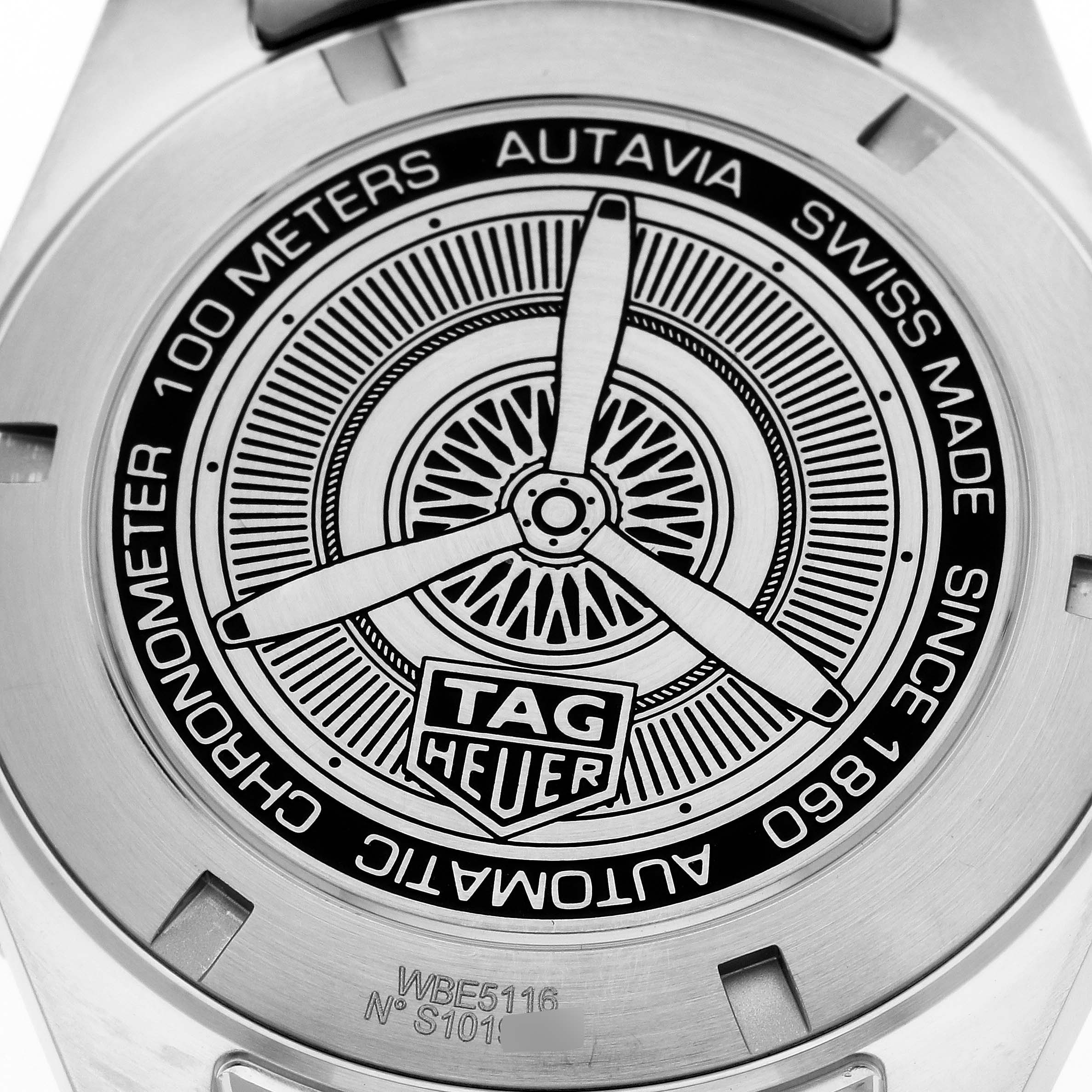 The image shows the back case of a Tag Heuer Autavia WBE5116.EB0173 Men's Stainless Steel Blue Dial WBE5116.EB0173 Men's Stainless Steel Blue Dial watch featuring engravings and branding details.