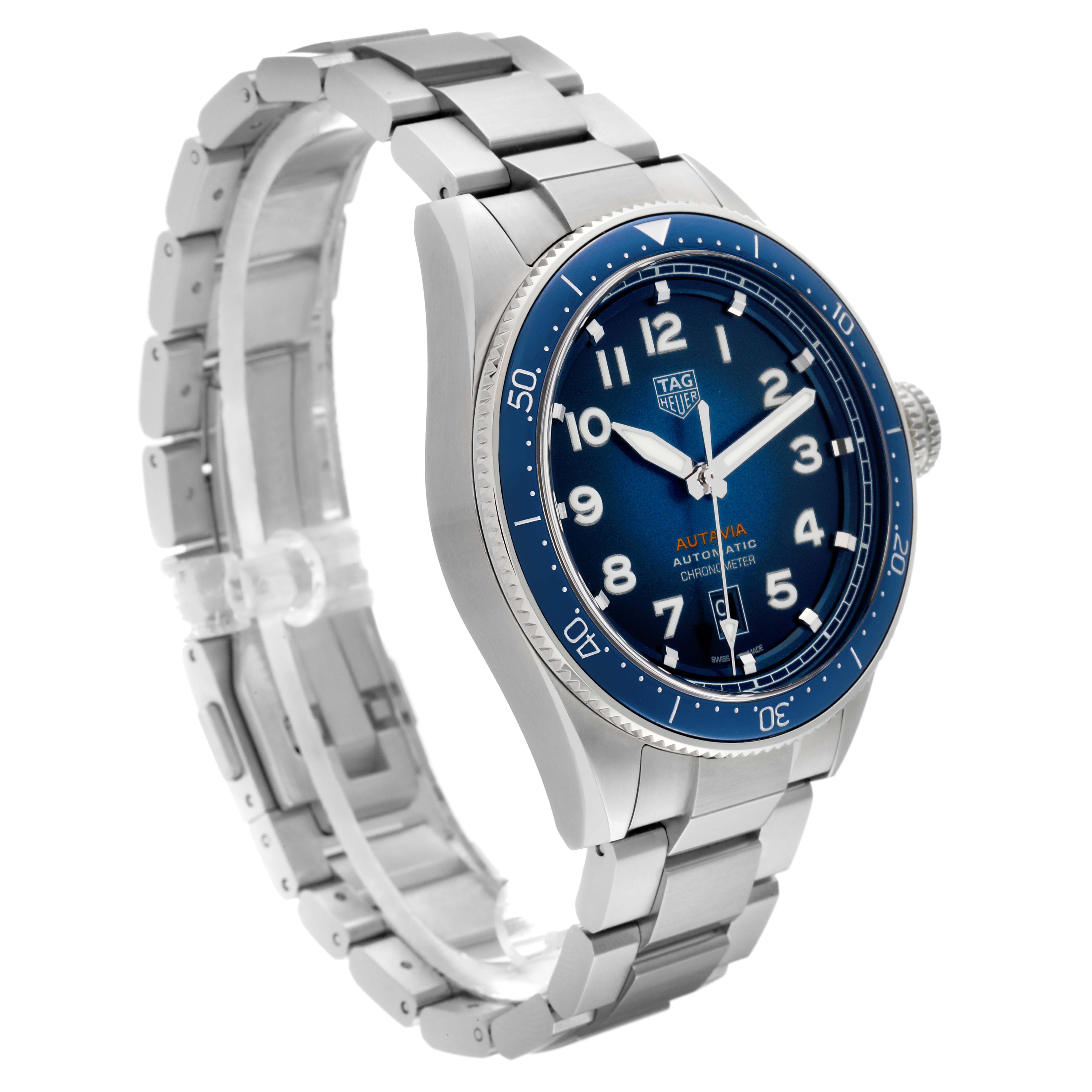 The image shows a side angle of the Tag Heuer Autavia WBE5116.EB0173 Men's Stainless Steel Blue Dial WBE5116.EB0173 Men's Stainless Steel Blue Dial watch, highlighting its blue dial, bezel, and stainless steel bracelet.