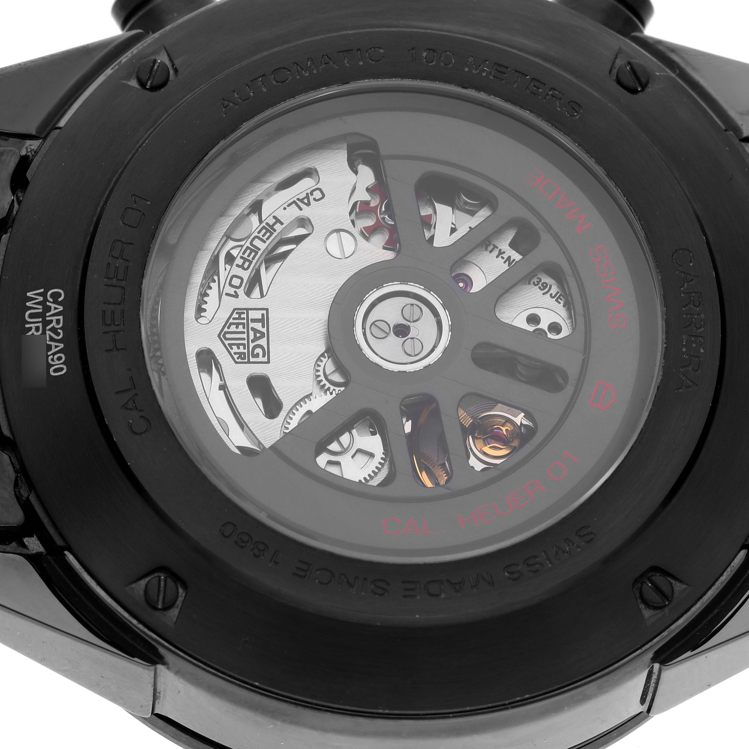 The image shows the back view of a Tag Heuer Carrera CAR2A90.FT6071 Men's Ceramic Black Dial CAR2A90.FT6071 Men's Ceramic Black Dial model watch displaying its movement and internal mechanisms.