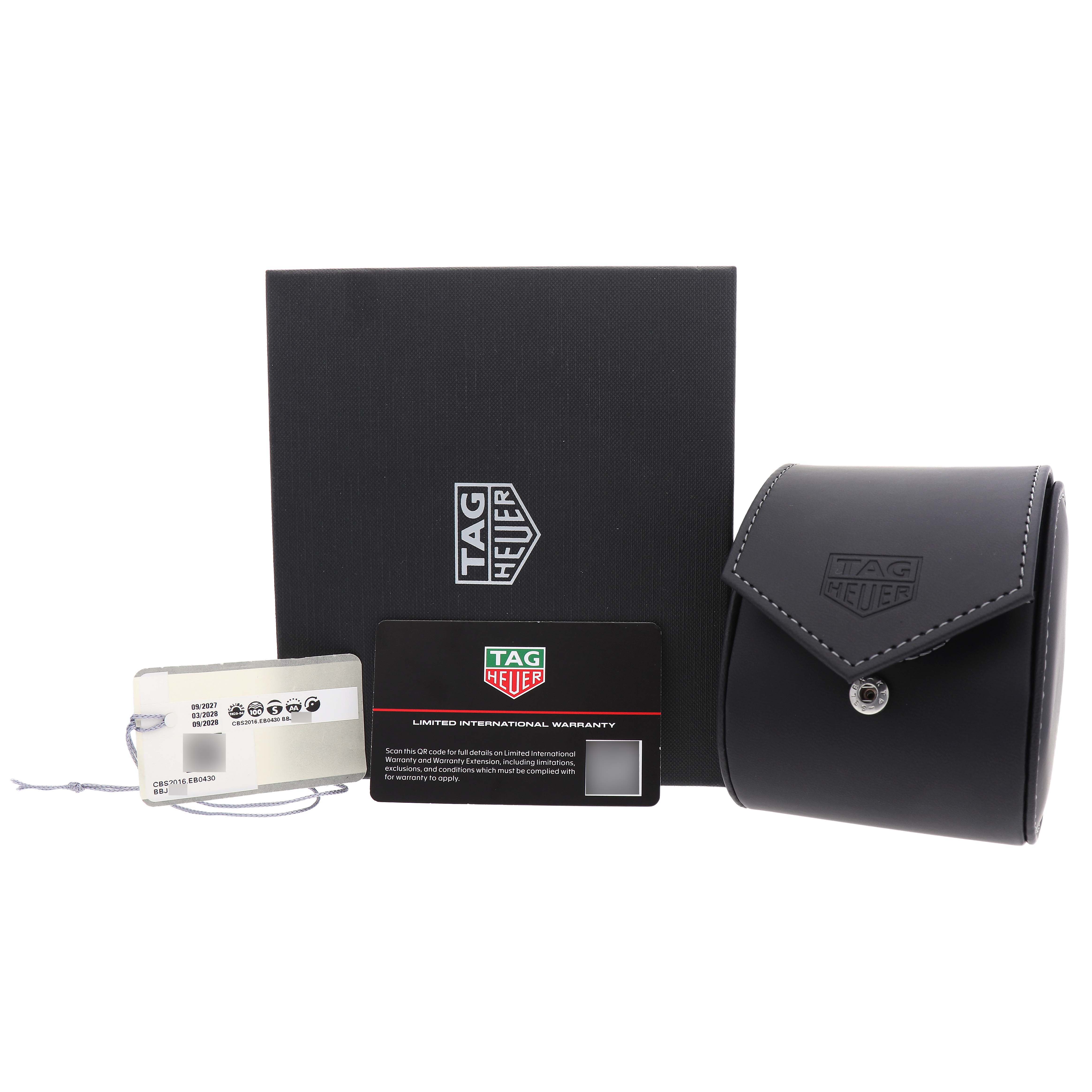 The image shows a Tag Heuer Carrera CBS2016.EB0430 Men's Stainless Steel Beige Dial watch box, leather case, warranty card, and tag from a straightforward angle.