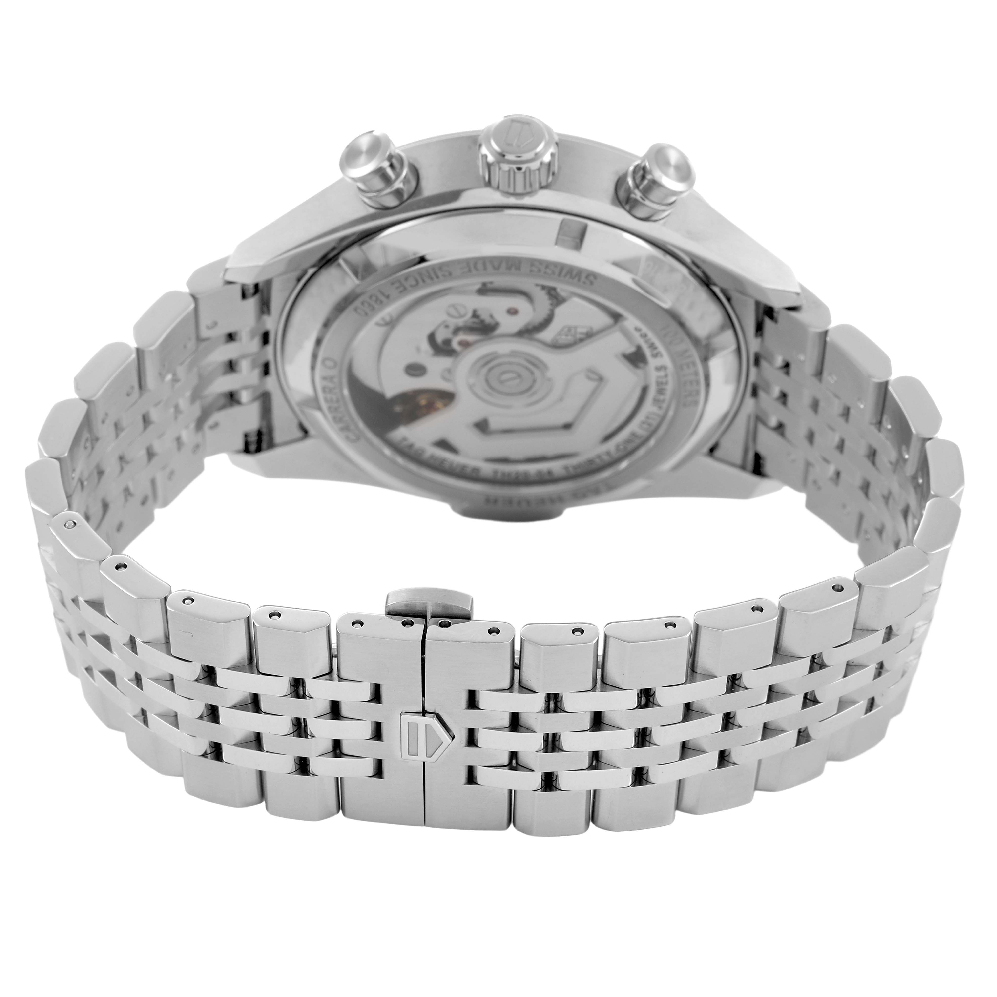 The image shows the back of a Tag Heuer Carrera CBS2016.EB0430 Men's Stainless Steel Beige Dial watch, highlighting the movement and stainless steel bracelet.