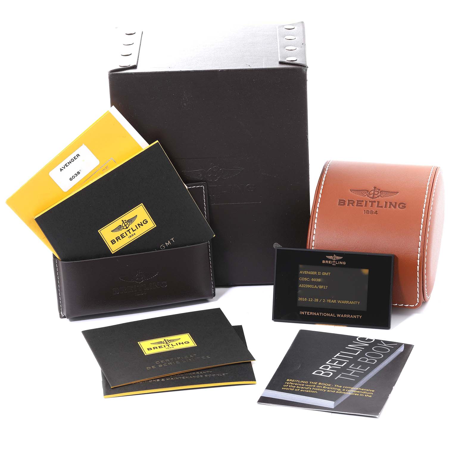The image shows documentation, packaging, and a warranty card for the Breitling Avenger A32390 Men's Stainless Steel Black Dial A32390 Men's Stainless Steel Black Dial model watch.