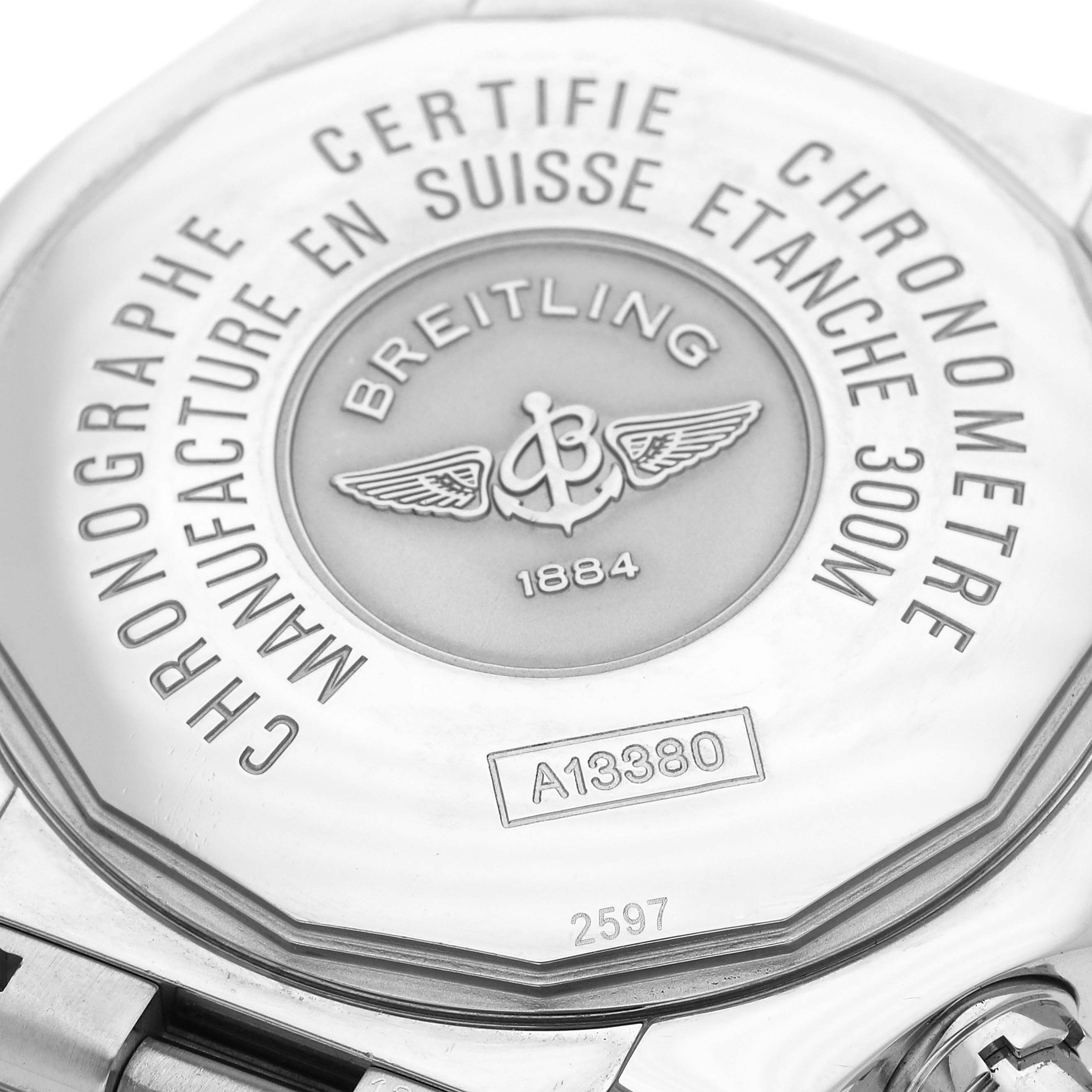 The image shows the case back of a Breitling Avenger A1338012/B975 Men's Stainless Steel Black Dial A1338012/B975 Men's Stainless Steel Black Dial watch, highlighting its engravings and serial number.