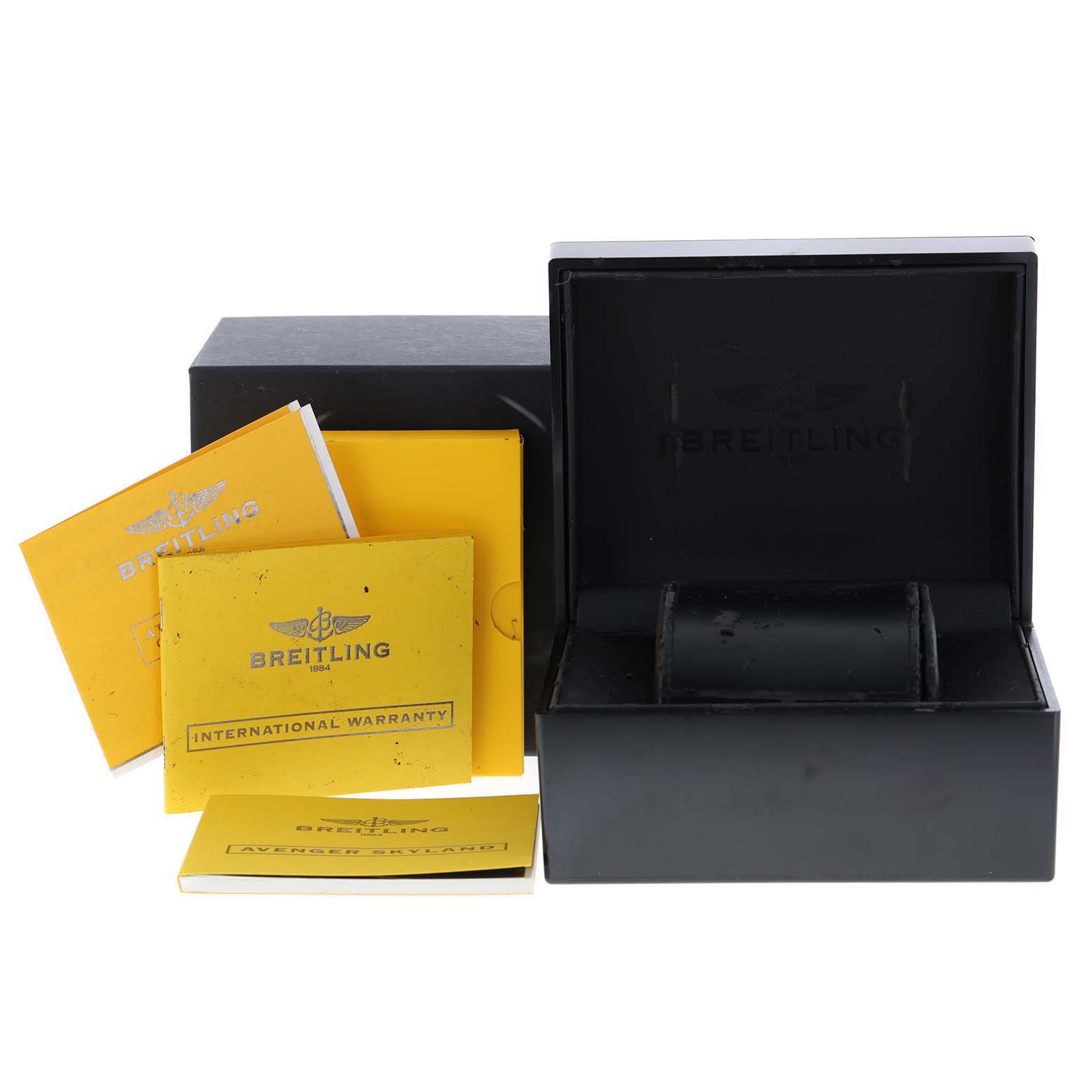 The image shows the packaging and accessories for a Breitling Avenger A13381 Men's Stainless Steel Grey Dial A13381 Men's Stainless Steel Grey Dial watch, including the box and warranty cards.