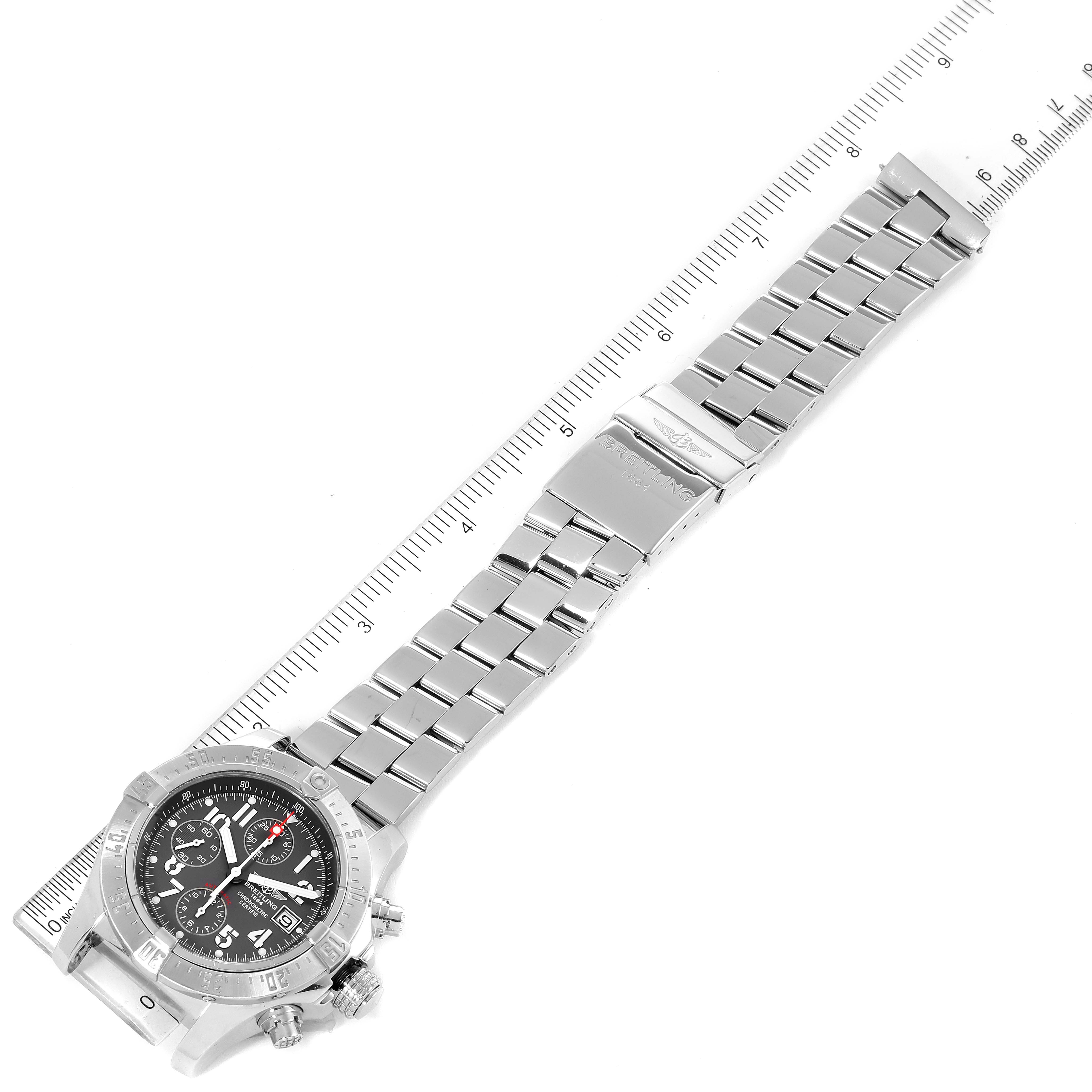The Breitling Avenger A13381 Men's Stainless Steel Grey Dial A13381 Men's Stainless Steel Grey Dial watch is shown from an angled top-down view, displaying the full bracelet, clasp, and partially the watch face.