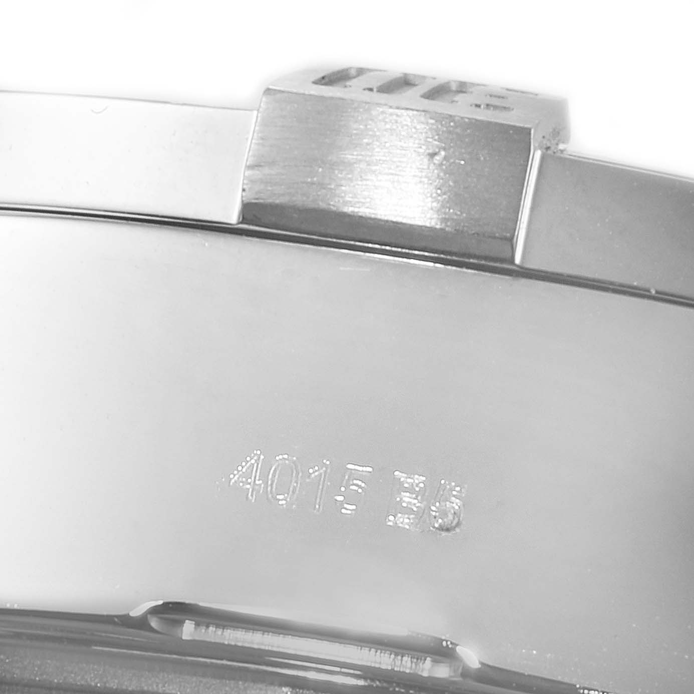 The image shows a close-up of the engraved caseback and side of the Breitling Avenger A13371 Men
s Stainless Steel Black Dial A13371 Men
s Stainless Steel Black Dial watch, including part of the crown or pusher.