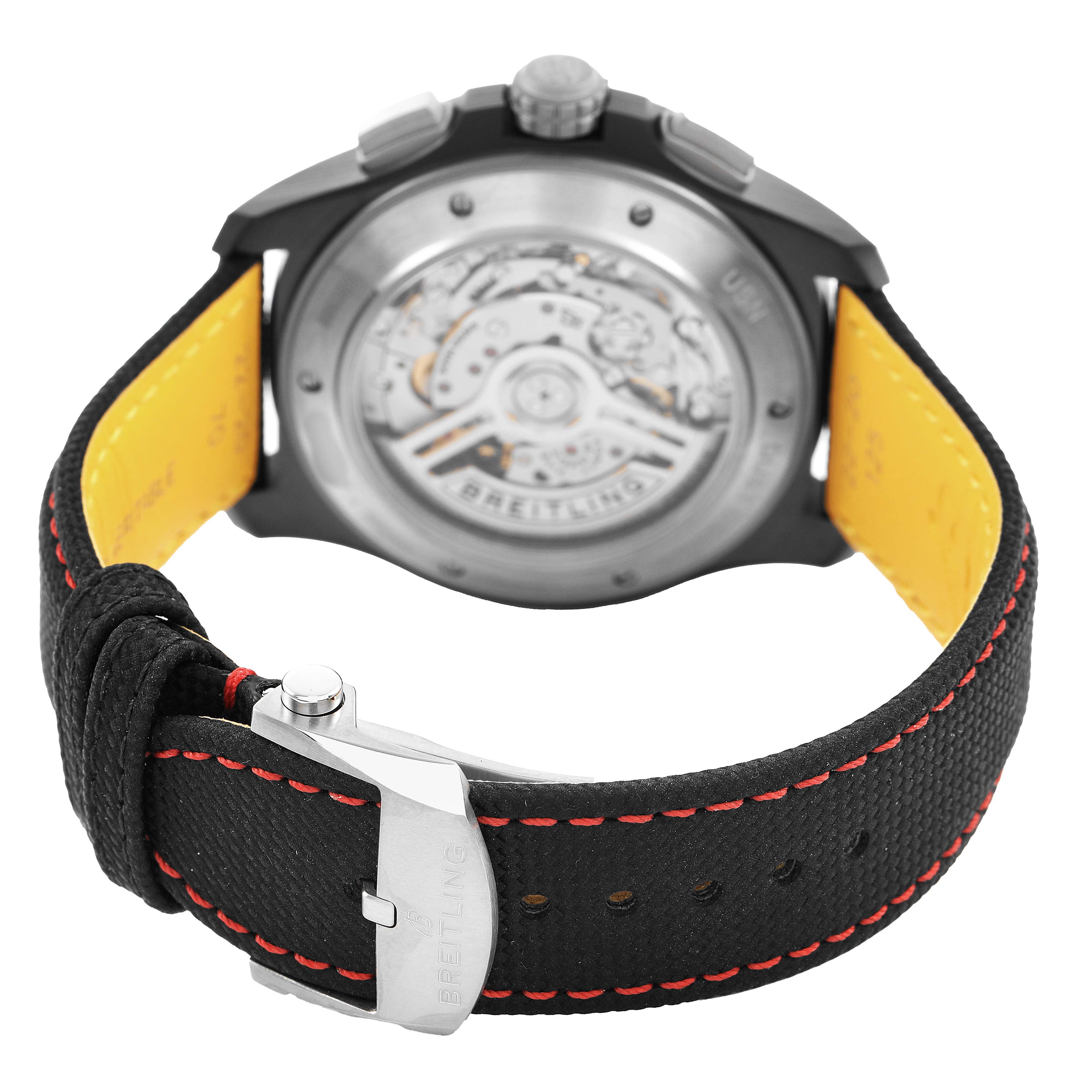 The image shows the back view of a Breitling Avenger SB01473A1B1X1 Men's Ceramic Black Dial watch, highlighting the transparent case back and watch strap clasp.