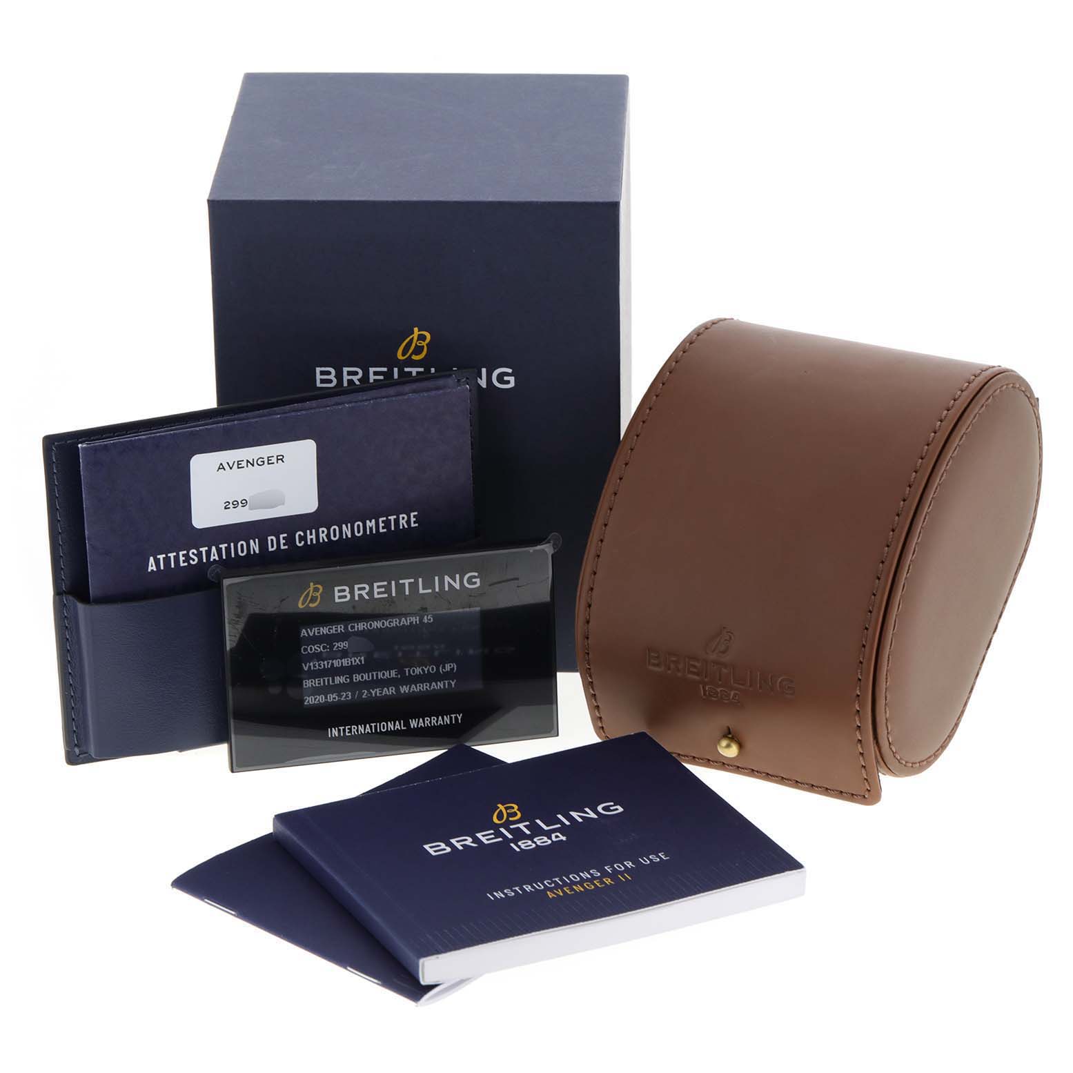 This image shows the packaging and accessories of a Breitling Avenger V13317 Men's Titanium Black Dial V13317 Men's Titanium Black Dial watch, including a box, case, manuals, and warranty card.