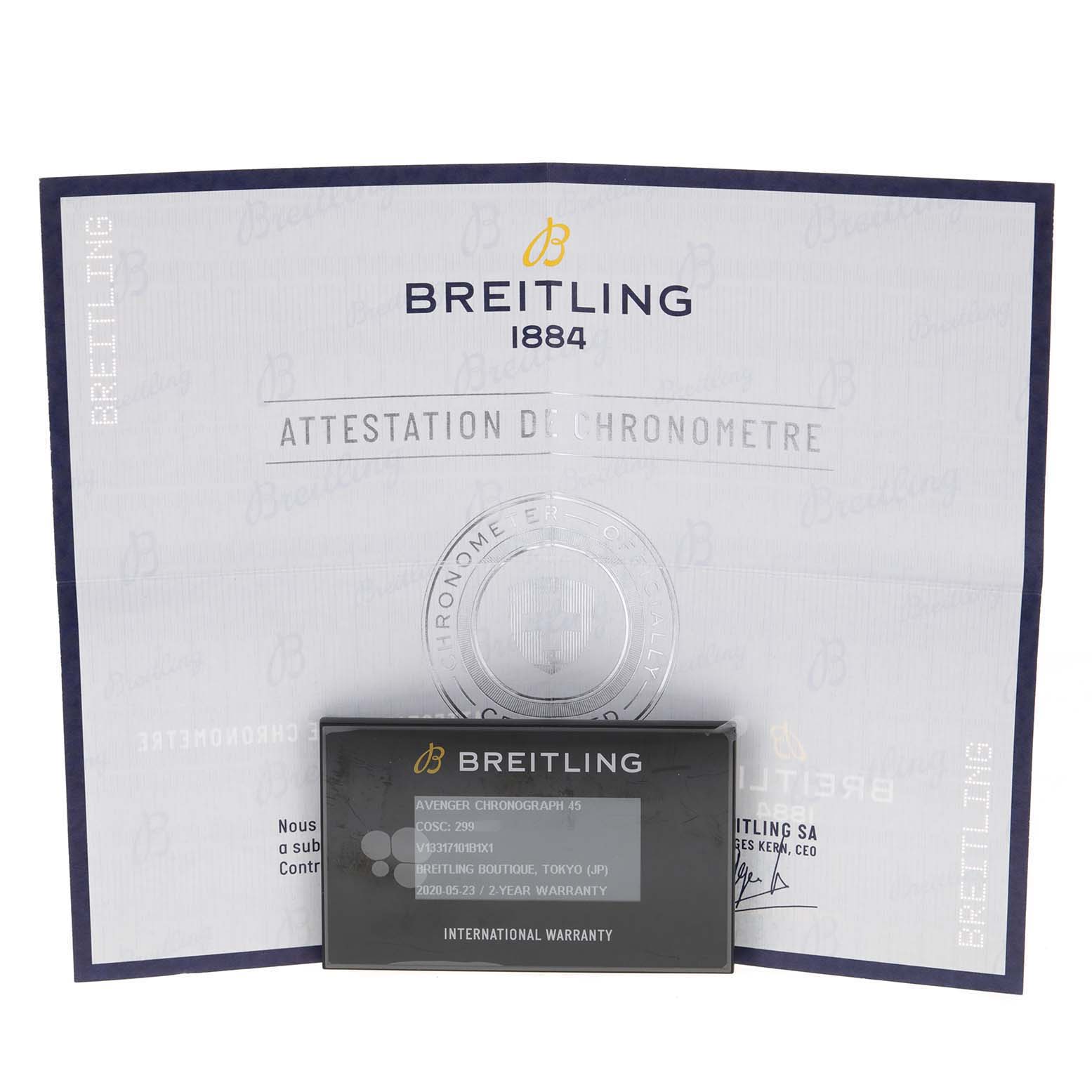 The image shows the warranty card and certificate of authenticity for a Breitling Avenger V13317 Men's Titanium Black Dial V13317 Men's Titanium Black Dial watch.
