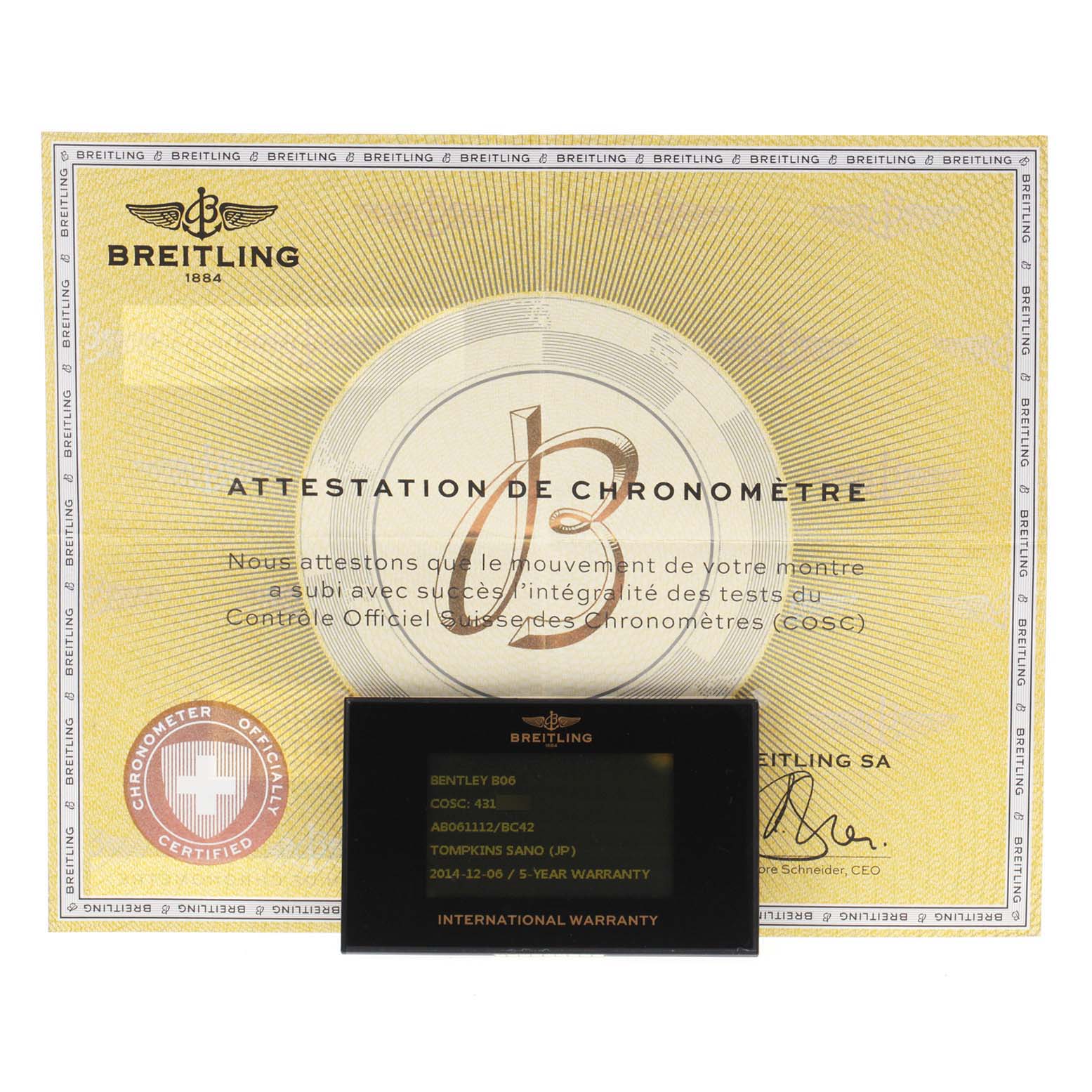 The image shows a Breitling Bentley AB061112.BD80.990A Men's Stainless Steel Black Dial AB061112.BD80.990A Men's Stainless Steel Black Dial model warranty card and chronometer certificate from a top-down angle.