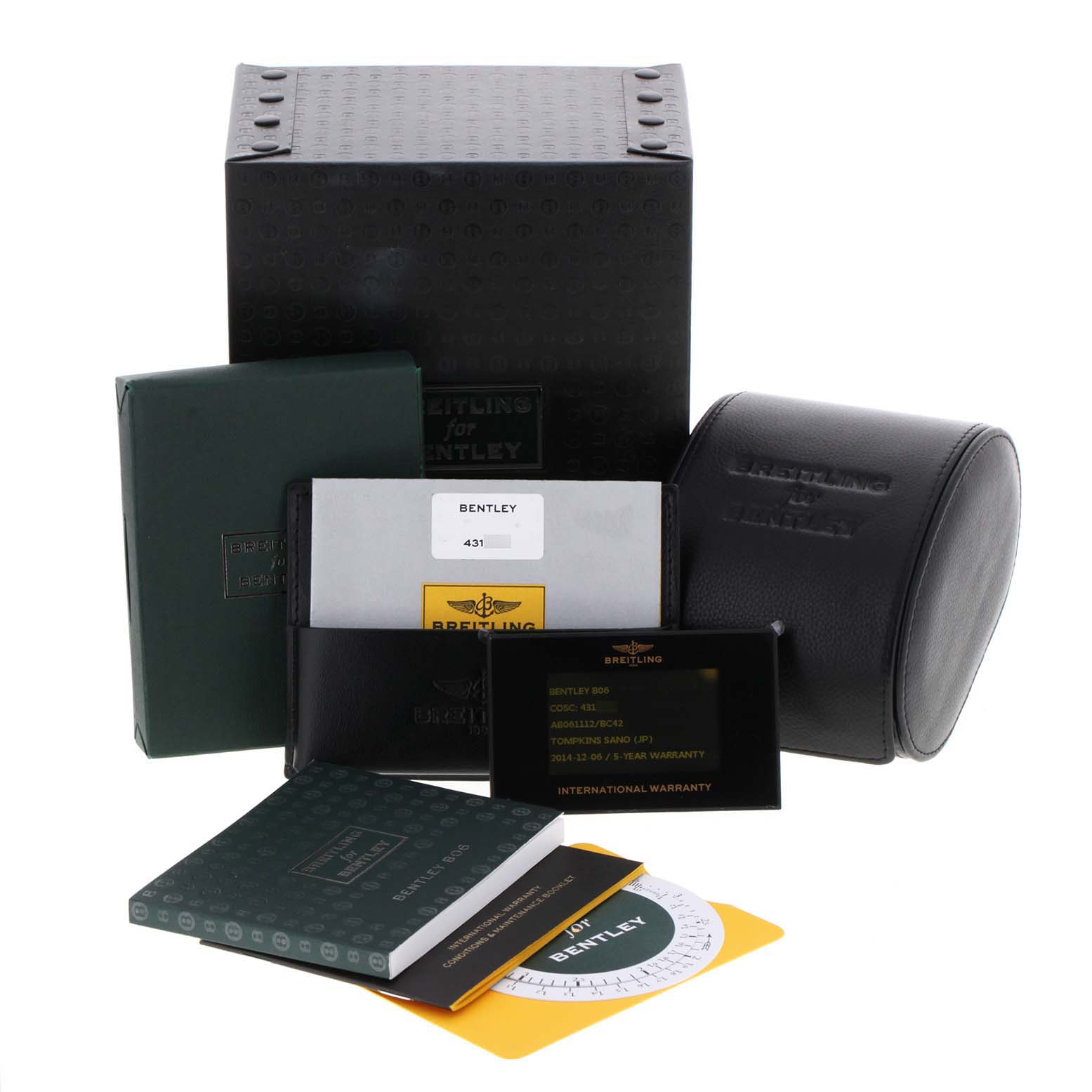 The image shows the packaging and accessories of a Bentley model by Breitling, including boxes, manuals, and warranty cards.