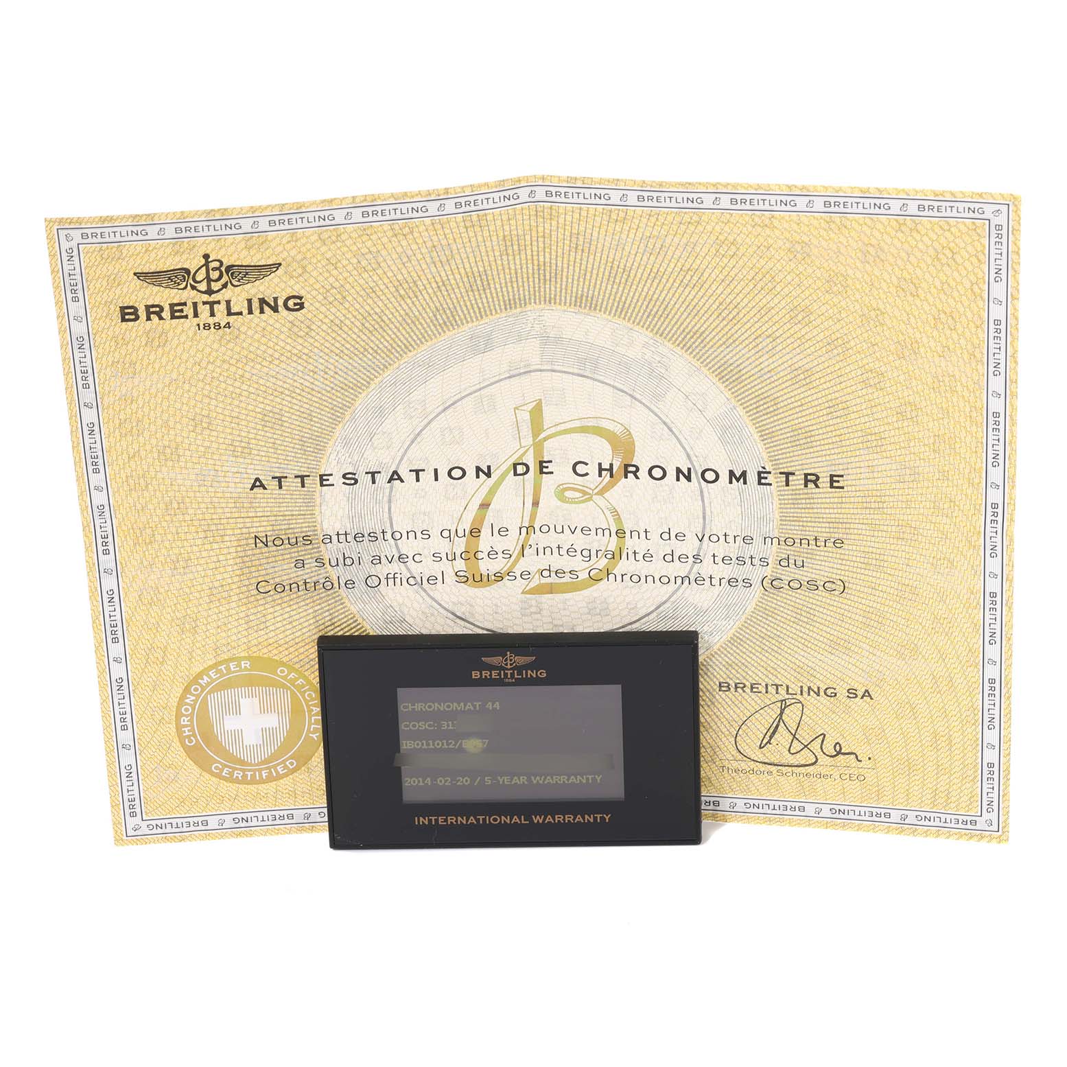 The image shows the warranty card and chronometer certificate for the Chronomat model by Breitling.