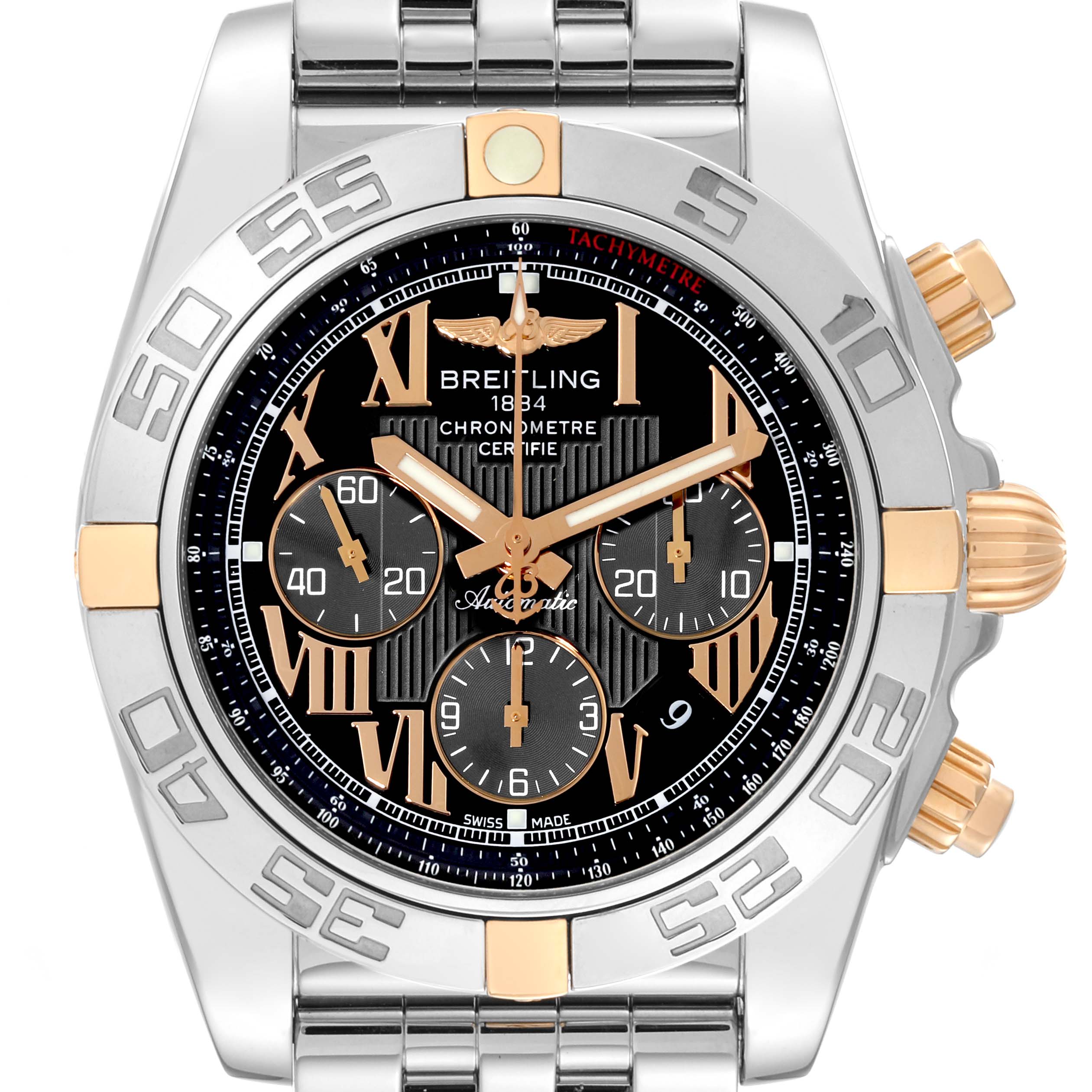The image shows a front view of the Breitling Chronomat IB0110 Men's Stainless Steel Black Dial IB0110 Men's Stainless Steel Black Dial watch, featuring a metal bracelet, tachymeter, and chronograph subdials.