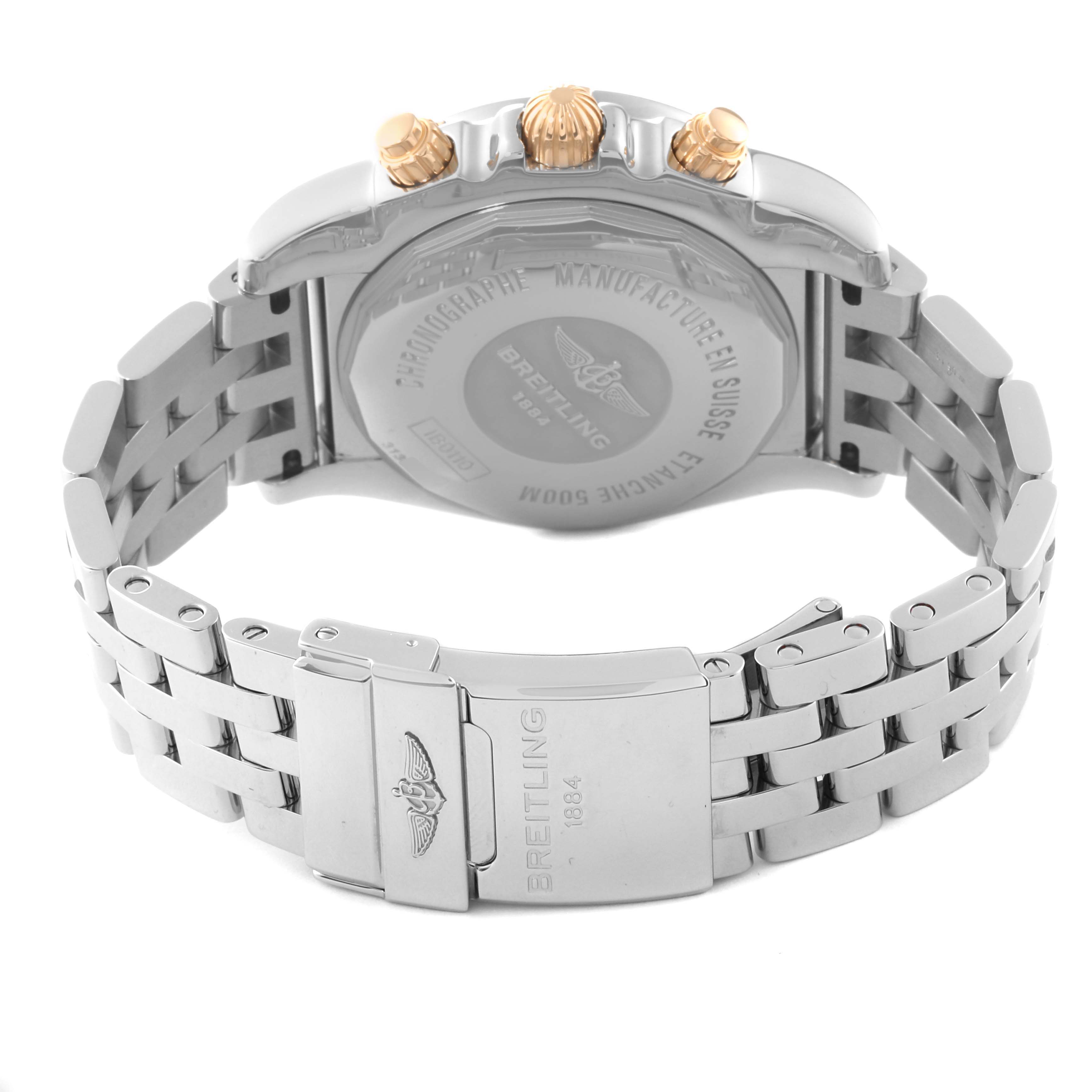 The image shows the back case, crown, and clasp of a Breitling Chronomat IB0110 Men's Stainless Steel Black Dial IB0110 Men's Stainless Steel Black Dial watch from a rear angle.