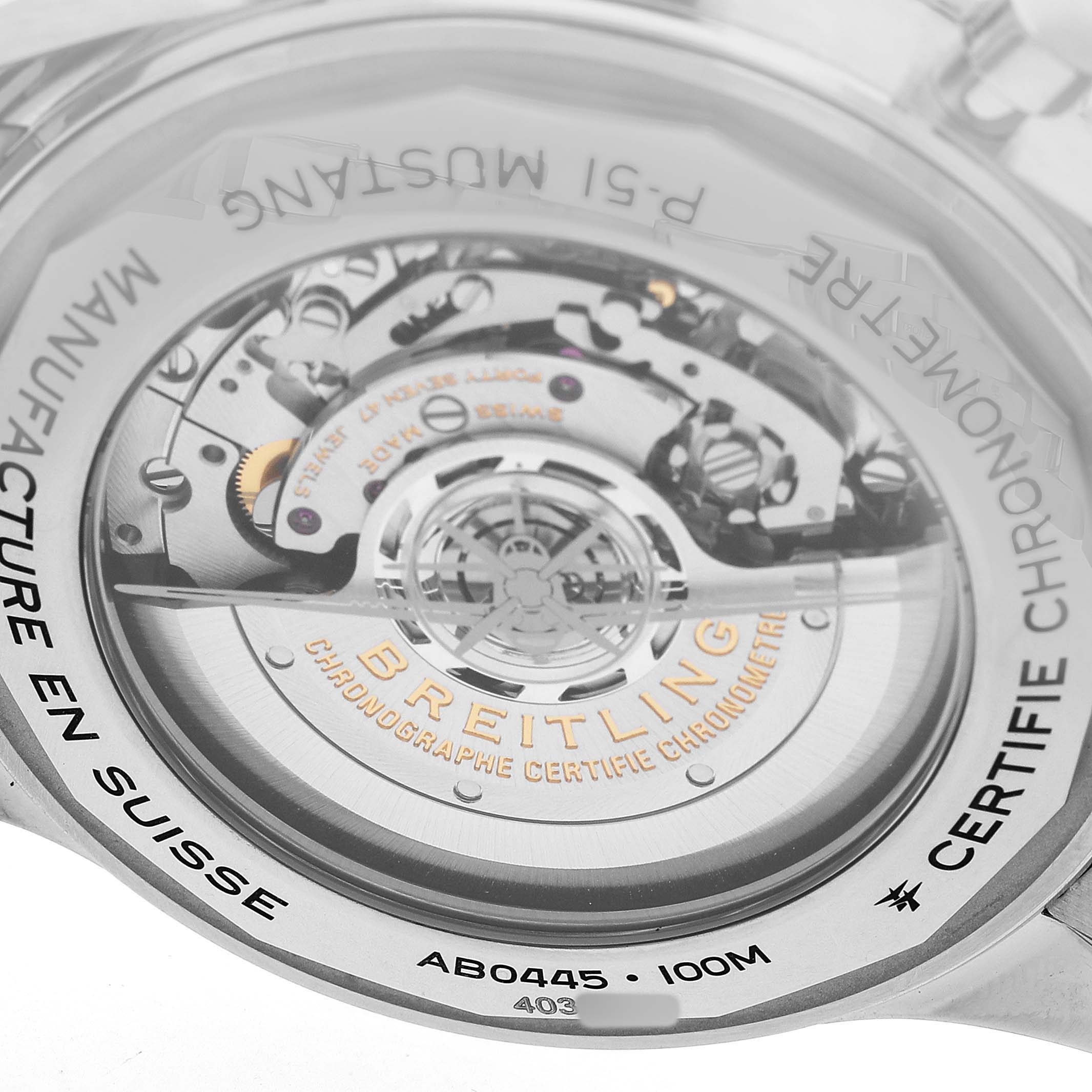 The image shows the back view of a Breitling Aviator AB0445 Men's Stainless Steel Black Dial watch, highlighting the inner mechanism and engravings.