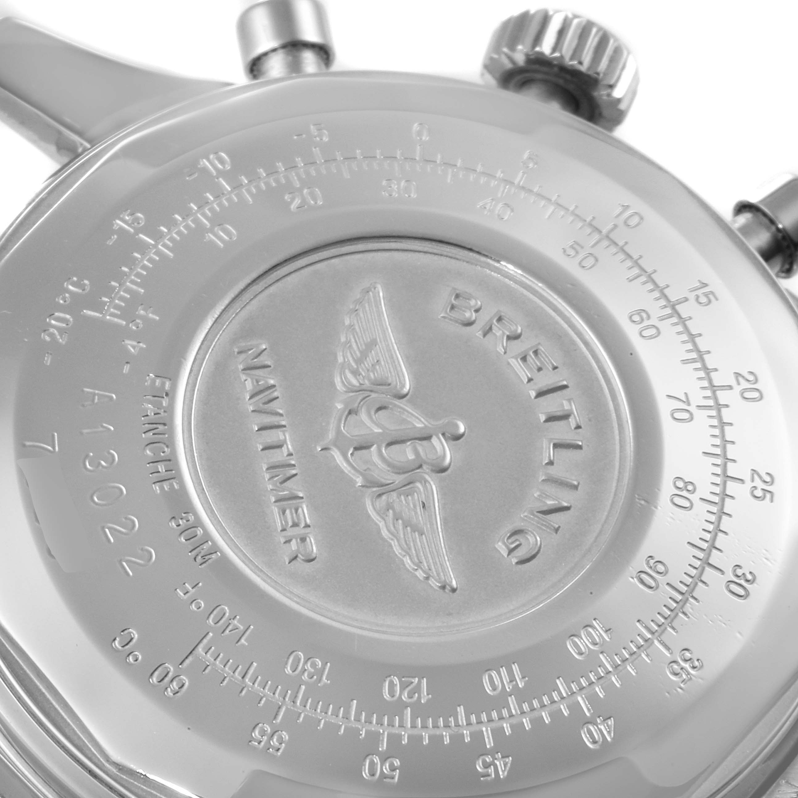 This image shows the back case and crown of a Breitling Navitimer A13022 Men's Stainless Steel Black Dial A13022 Men's Stainless Steel Black Dial watch from a close-up angle.