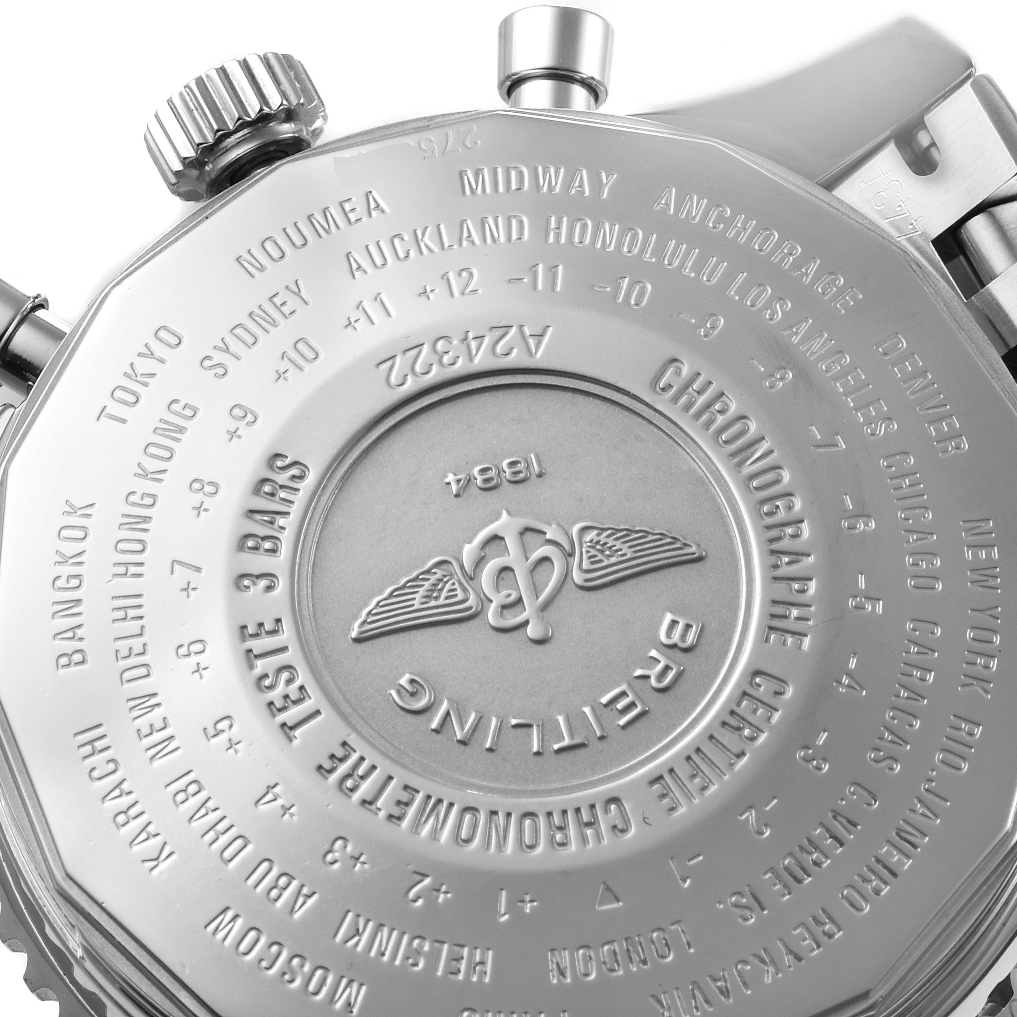 The image shows the engraved case back of a Breitling Navitimer A24322 Men
s Stainless Steel Silver Dial A24322 Men
s Stainless Steel Silver Dial watch, featuring various time zone markings.