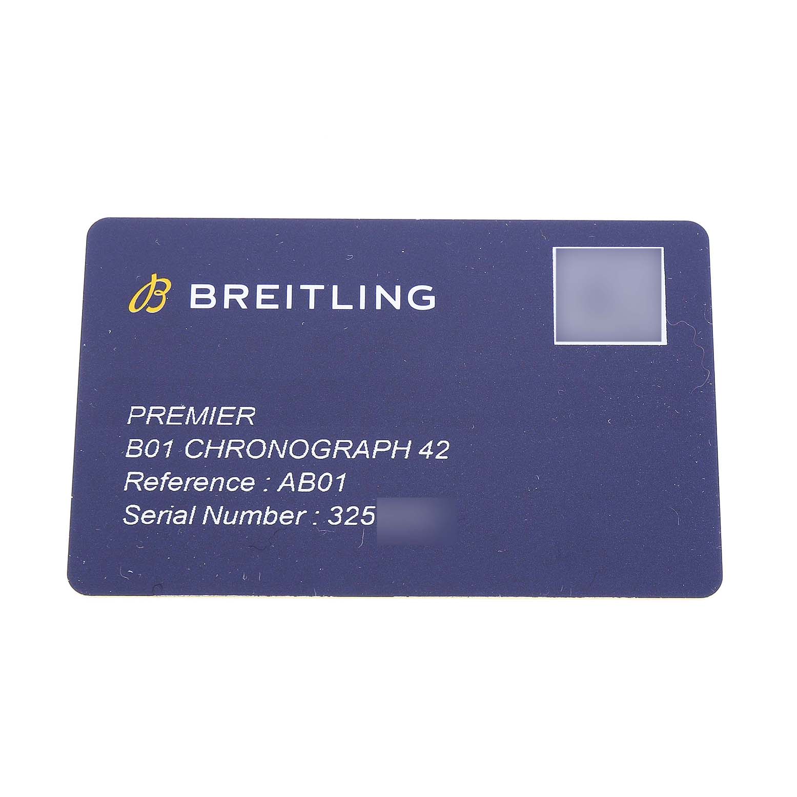 The image shows a warranty card for the Breitling Premier AB0118 Men's Stainless Steel Silver Dial B01 Chronograph 42, displaying reference and serial numbers.