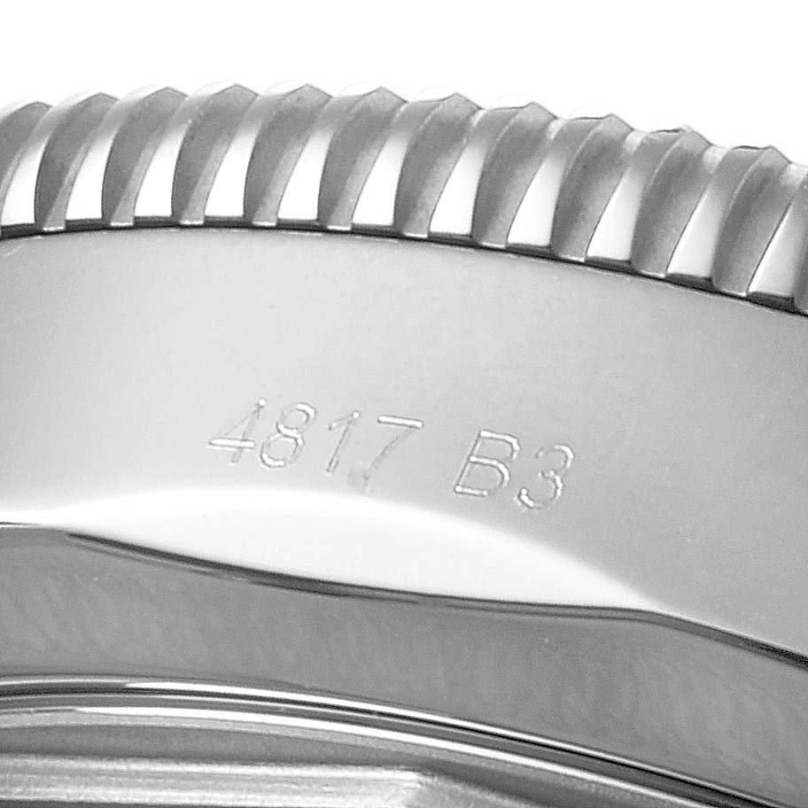 This image shows a close-up of the bezel and case side of the Breitling Superocean AB202016-C961-152A Men's Stainless Steel Blue Dial AB202016-C961-152A Men's Stainless Steel Blue Dial watch with visible serial numbers.