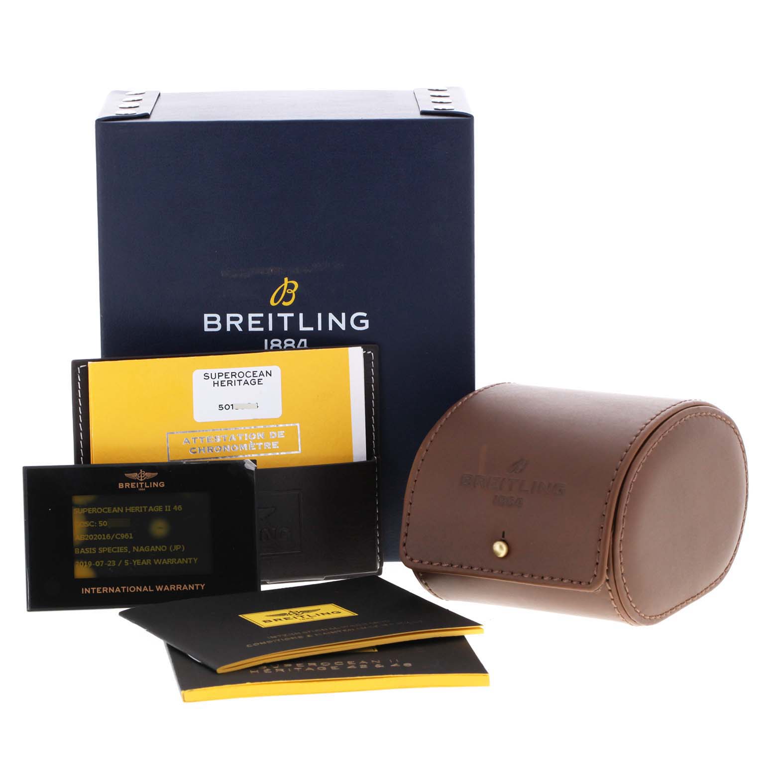 This image shows the packaging and accessories for the Breitling Superocean AB202016-C961-152A Men's Stainless Steel Blue Dial AB202016-C961-152A Men's Stainless Steel Blue Dial watch, including a box, warranty card, and leather case.