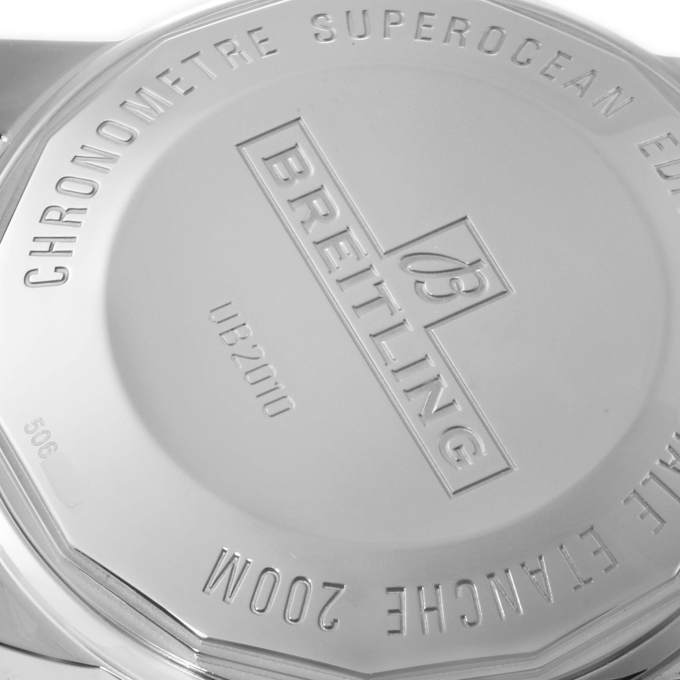 The image shows the case back of a Breitling Superocean UB201012/BG53/154A Men
s Stainless Steel Black Dial UB201012/BG53/154A Men
s Stainless Steel Black Dial watch with engraved branding and model details.