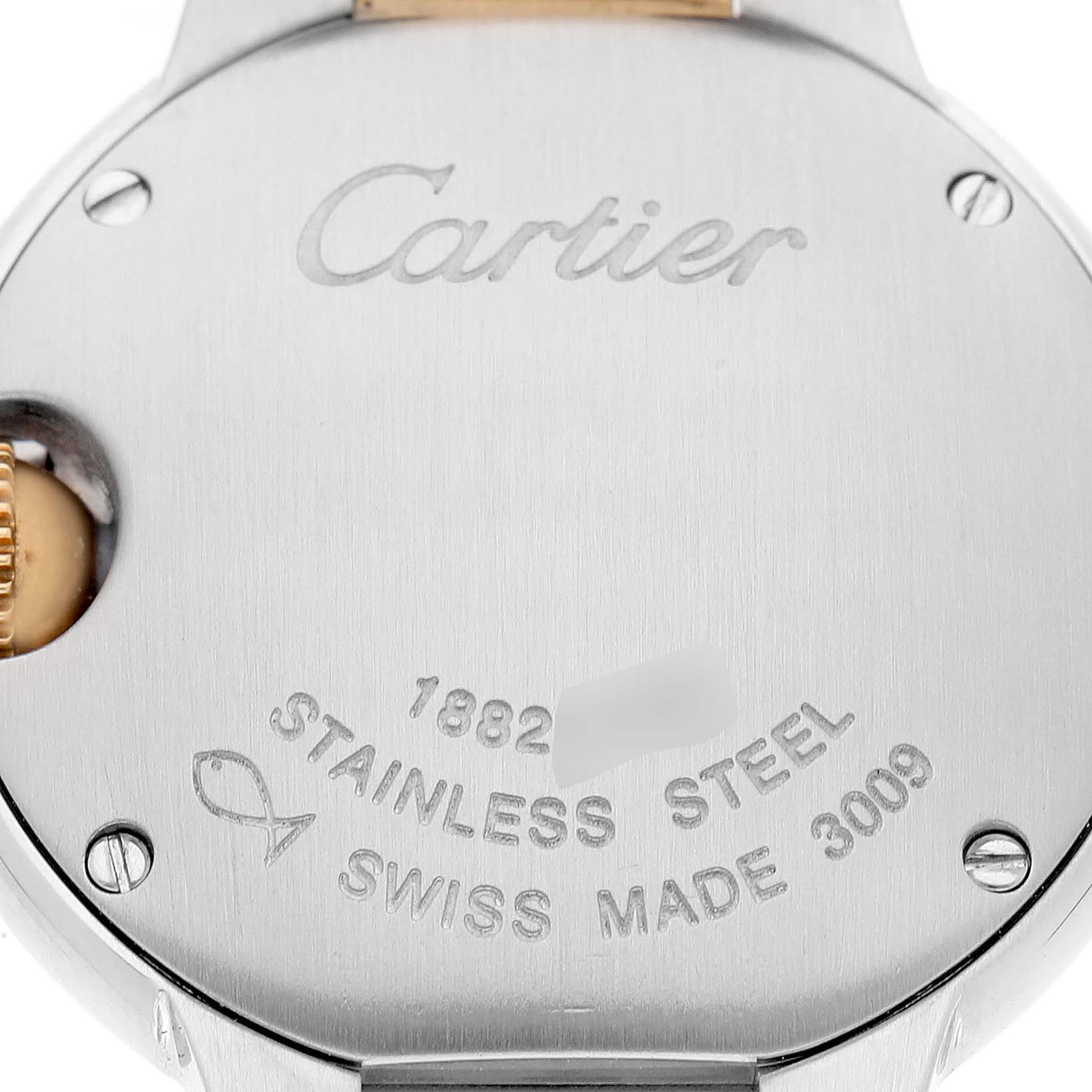 The image shows the case back of a Cartier Ballon Bleu W69007Z3 Women's Steel and Gold (two tone) Silver Dial, highlighting its stainless steel material and engravings.