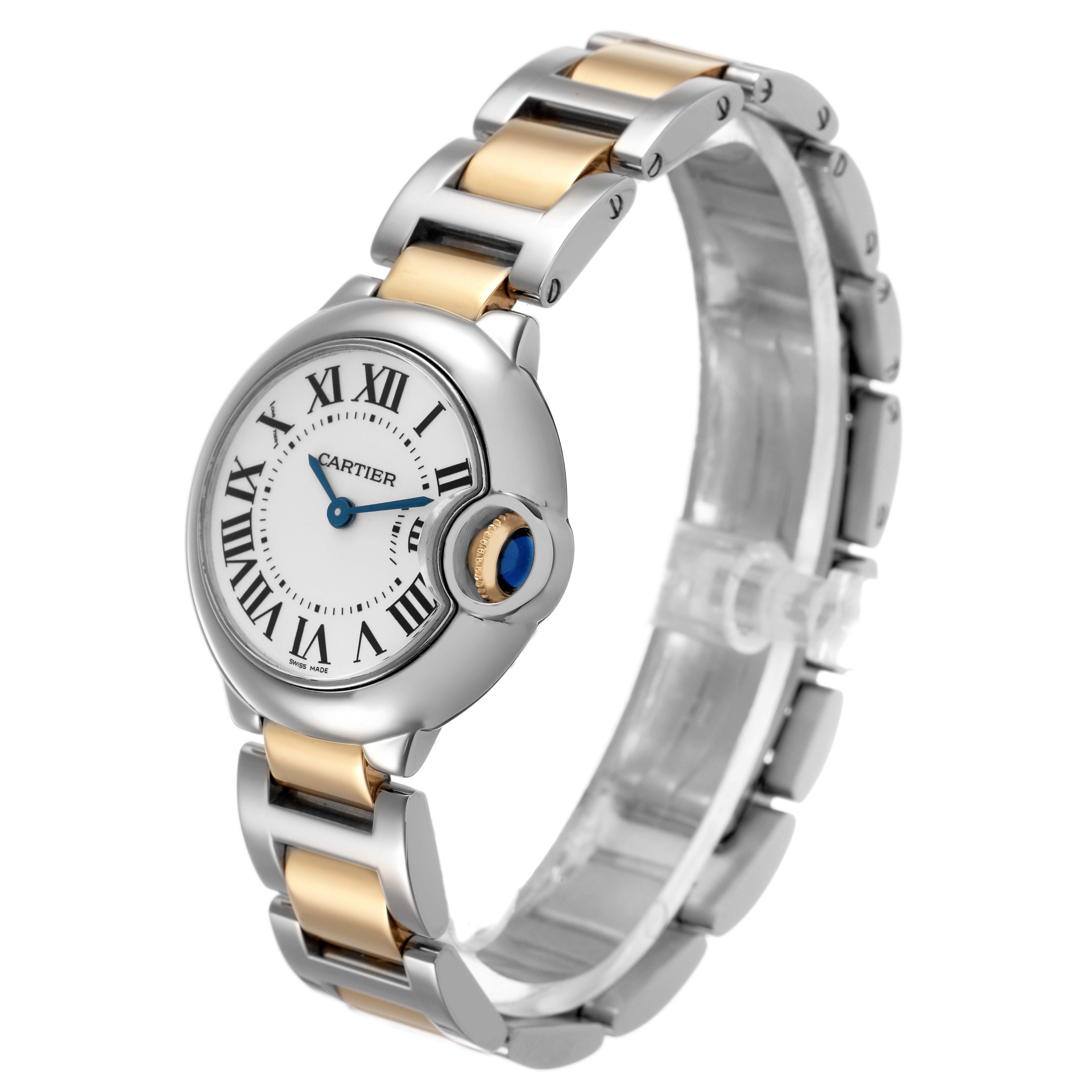 The Cartier Ballon Bleu W69007Z3 Women's Steel and Gold (two tone) Silver Dial watch is shown at a three-quarter angle, highlighting its round face, Roman numerals, and two-tone bracelet.