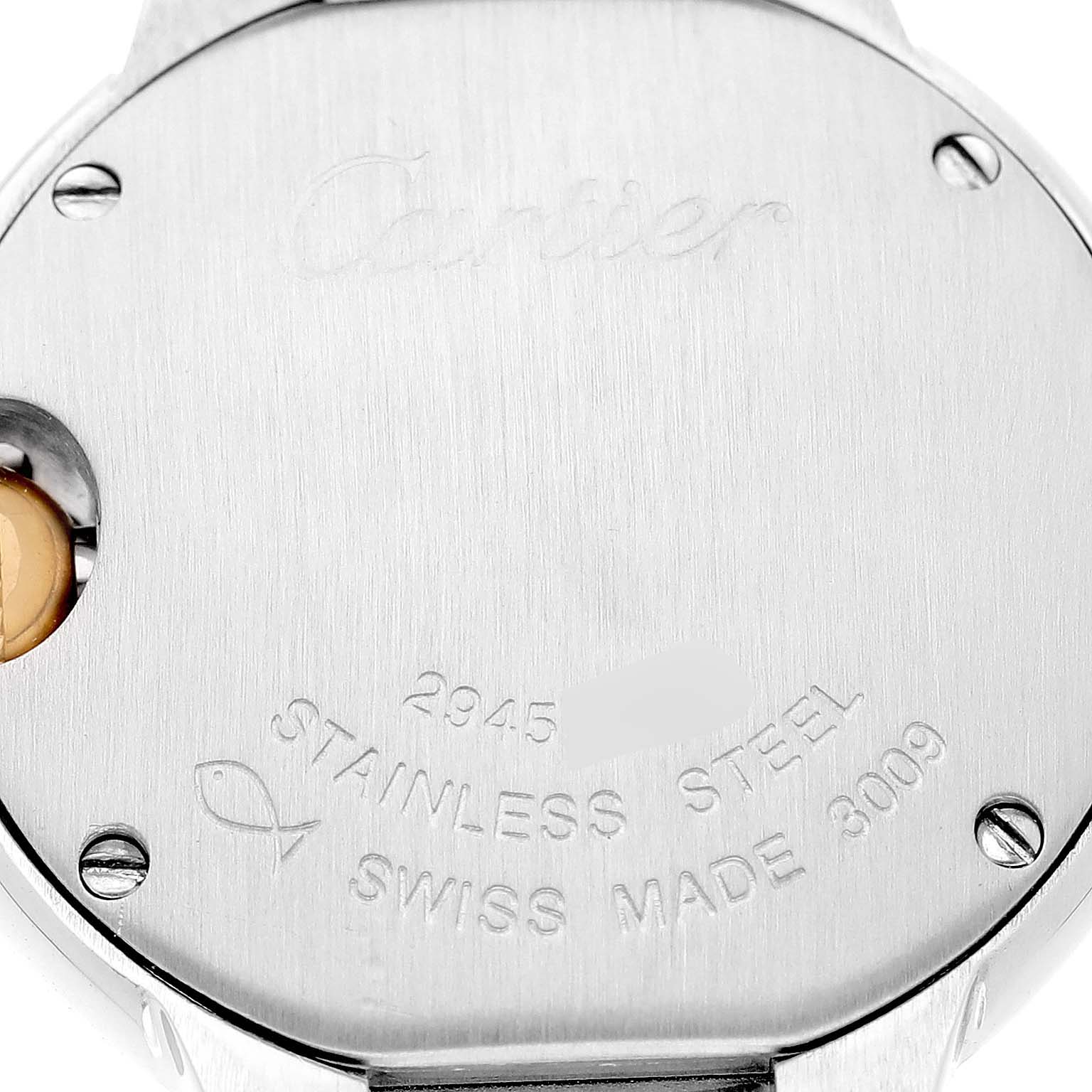The image shows the back casing of a Cartier Ballon Bleu W69007Z3 Women's Steel and Gold (two tone) Silver Dial watch, featuring engravings and screws.