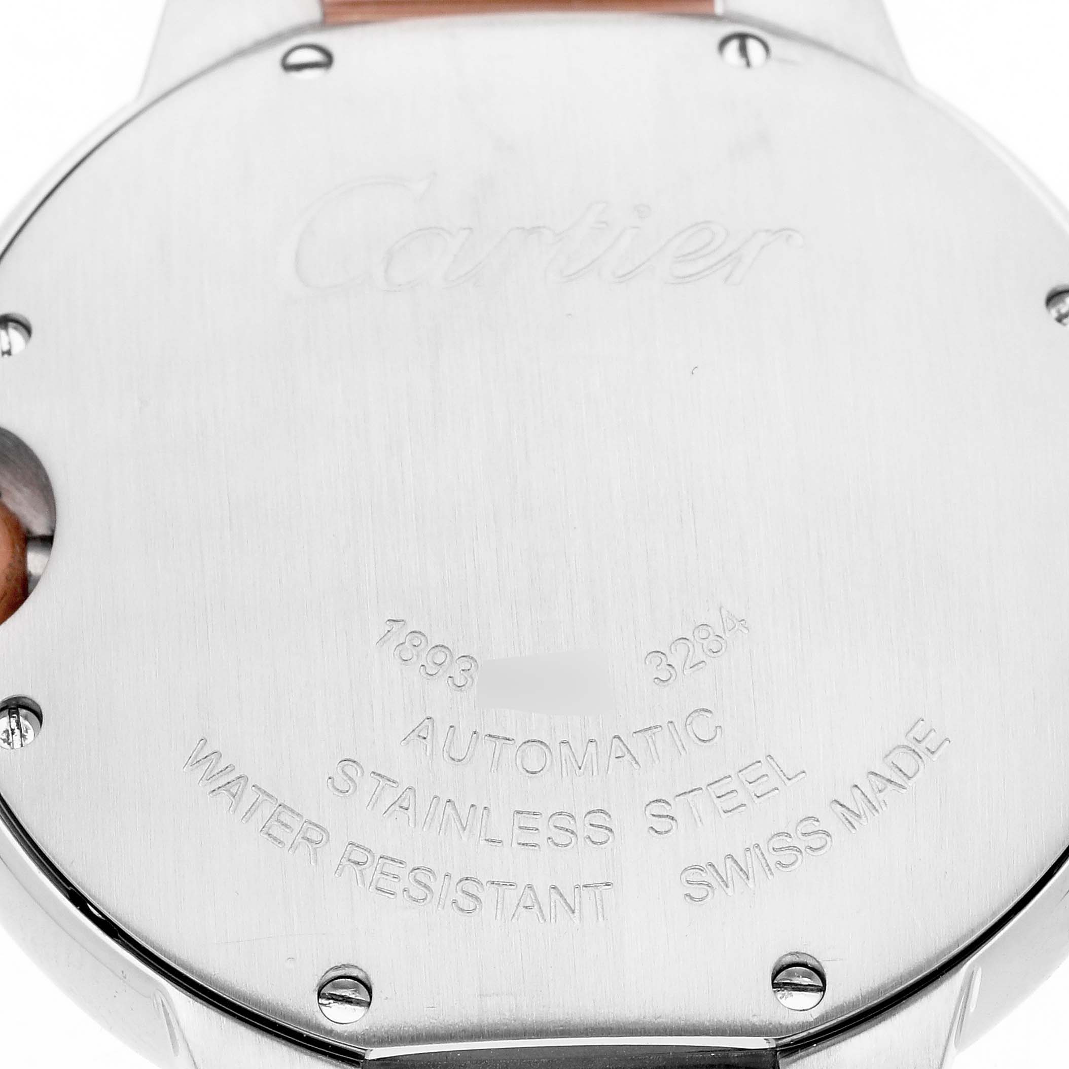 The image shows the back of a Cartier Ballon Bleu W3BB0018 Men
s Steel and Gold (two tone) Silver Dial W3BB0018 Men
s Steel and Gold (two tone) Silver Dial watch at a slight angle, highlighting its stainless steel casing and engraved details.