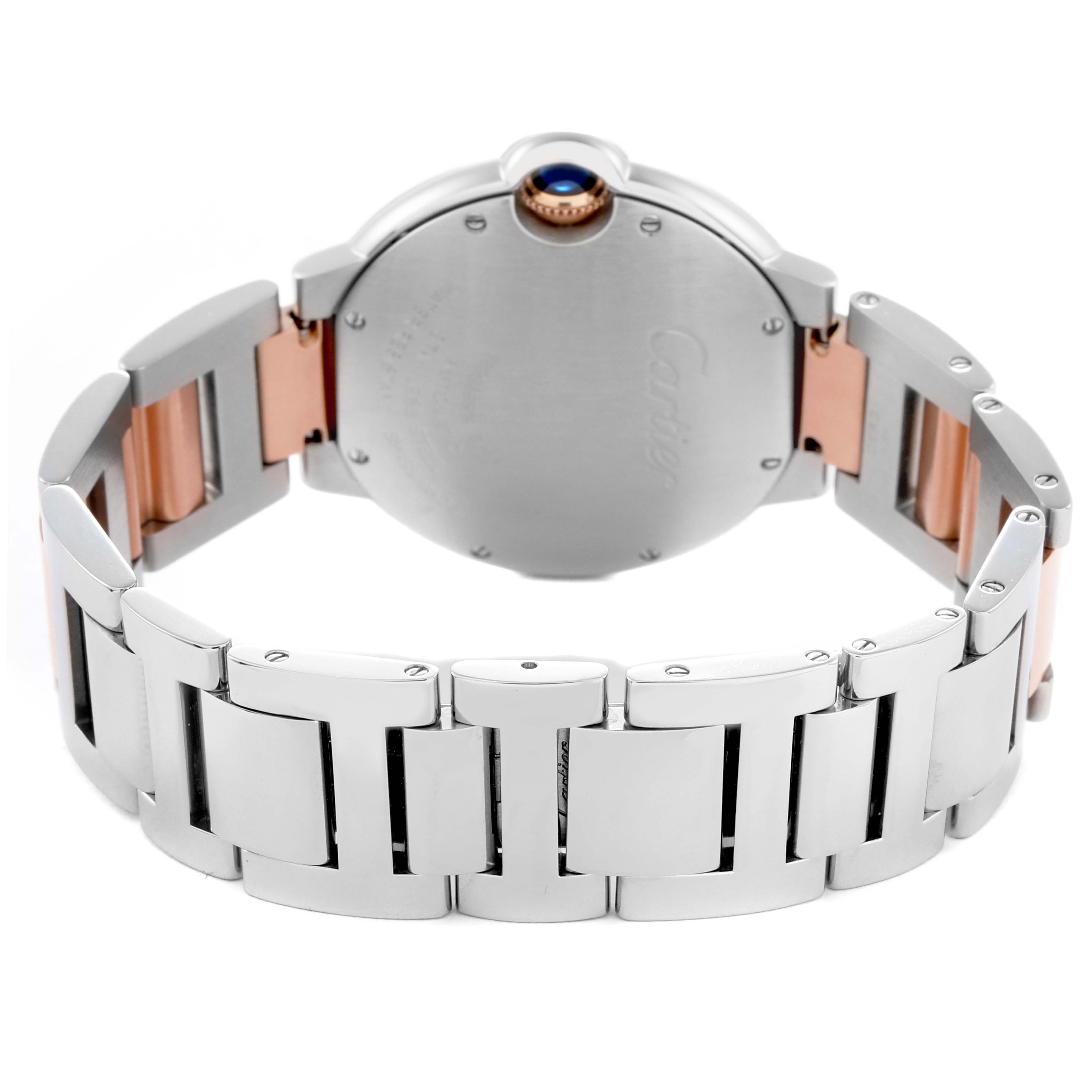 The image shows the back and bracelet of a Cartier Ballon Bleu W3BB0018 Men
s Steel and Gold (two tone) Silver Dial W3BB0018 Men
s Steel and Gold (two tone) Silver Dial watch, highlighting its two-tone metal links and crown.