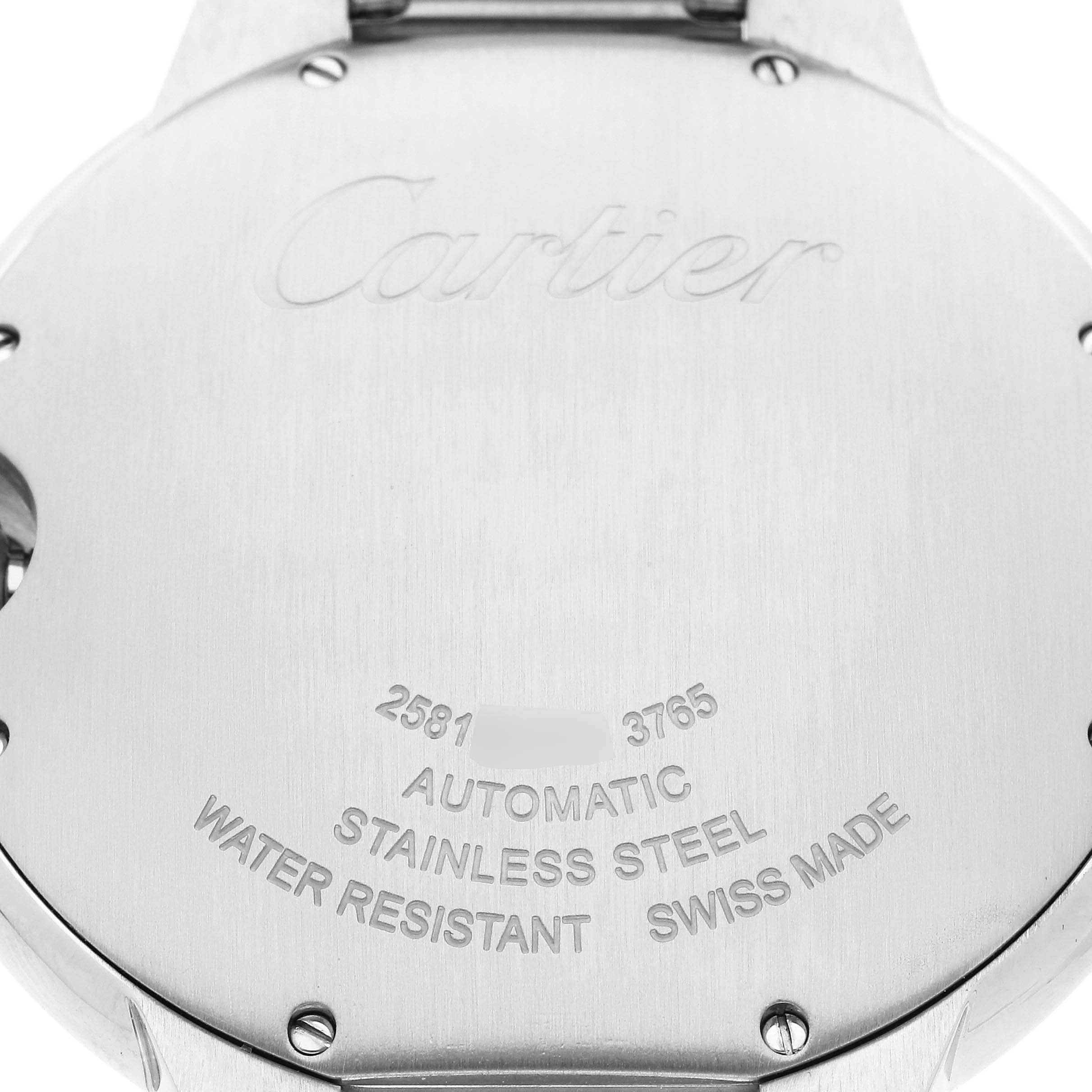 The image shows the back case of a Cartier Ballon Bleu W69012Z4 Men
s Stainless Steel Silver Dial W69012Z4 Men
s Stainless Steel Silver Dial watch, featuring engravings and screws.