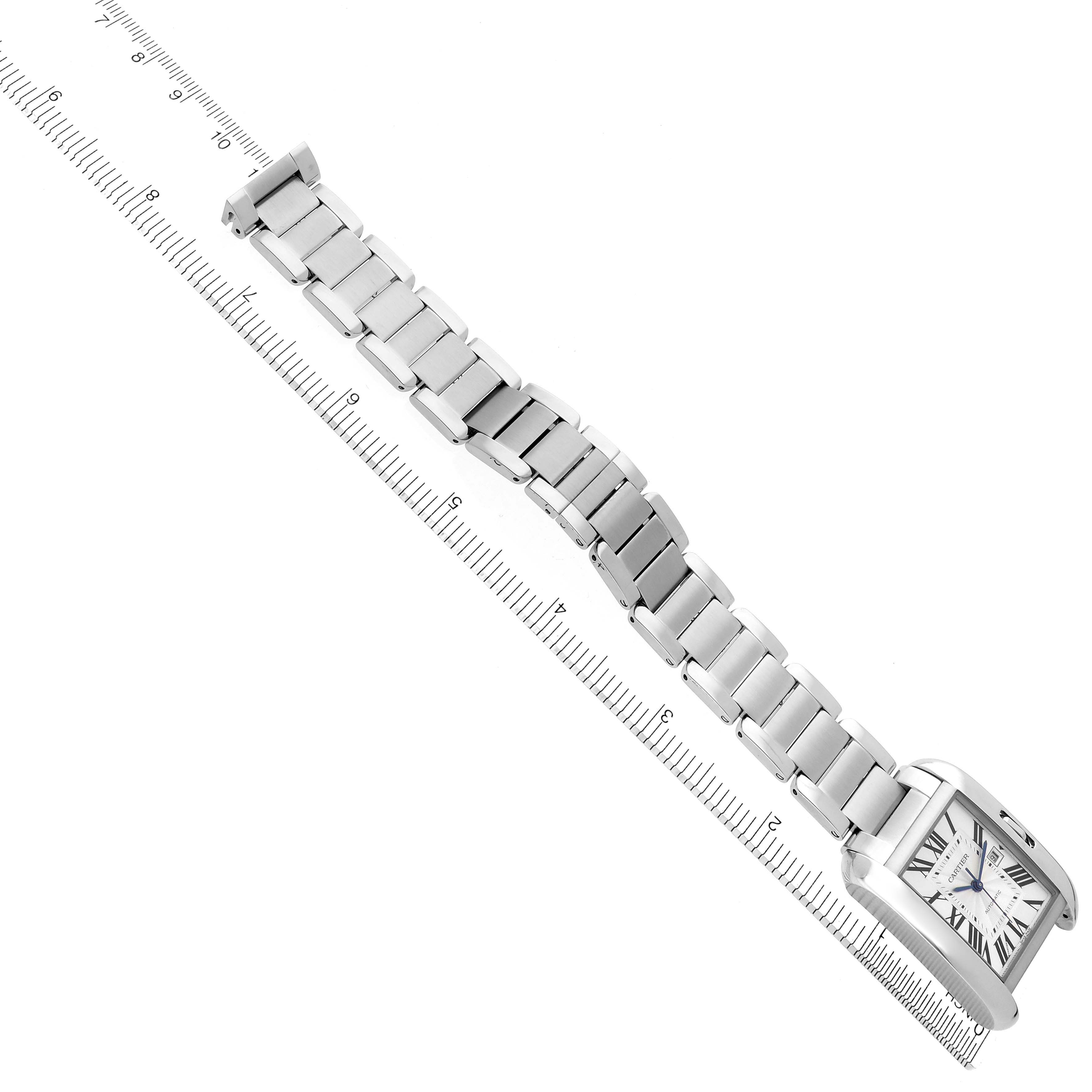 The Cartier Tank Anglaise W5310009 Men
s Stainless Steel Silver Dial W5310009 Men
s Stainless Steel Silver Dial watch is shown at an angled side view, displaying the full bracelet and face alongside a ruler for scale.