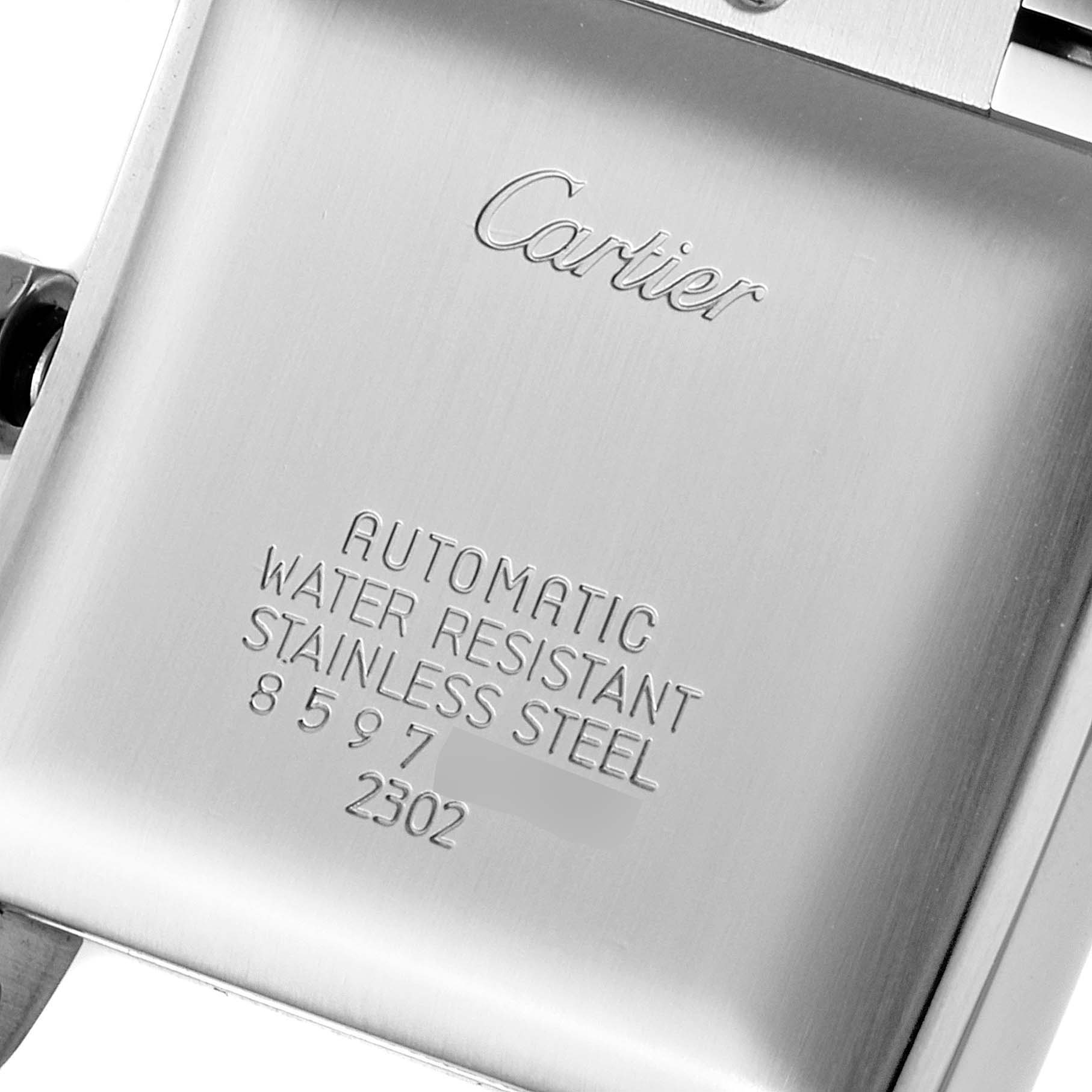 This image shows the back of the Cartier Tank Francaise W51002Q3 Men's Stainless Steel Silver Dial W51002Q3 Men's Stainless Steel Silver Dial watch, highlighting its engraved text and stainless steel finish.