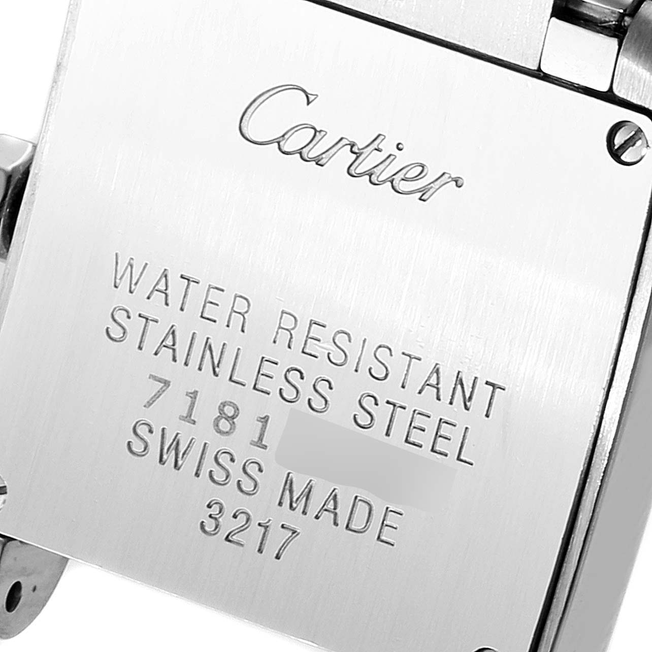 This image shows the stainless steel case back of the Cartier Tank Francaise W51028Q3 Women's Stainless Steel Mother of Pearl Dial W51028Q3 Women's Stainless Steel Mother of Pearl Dial watch, displaying specifications and branding.