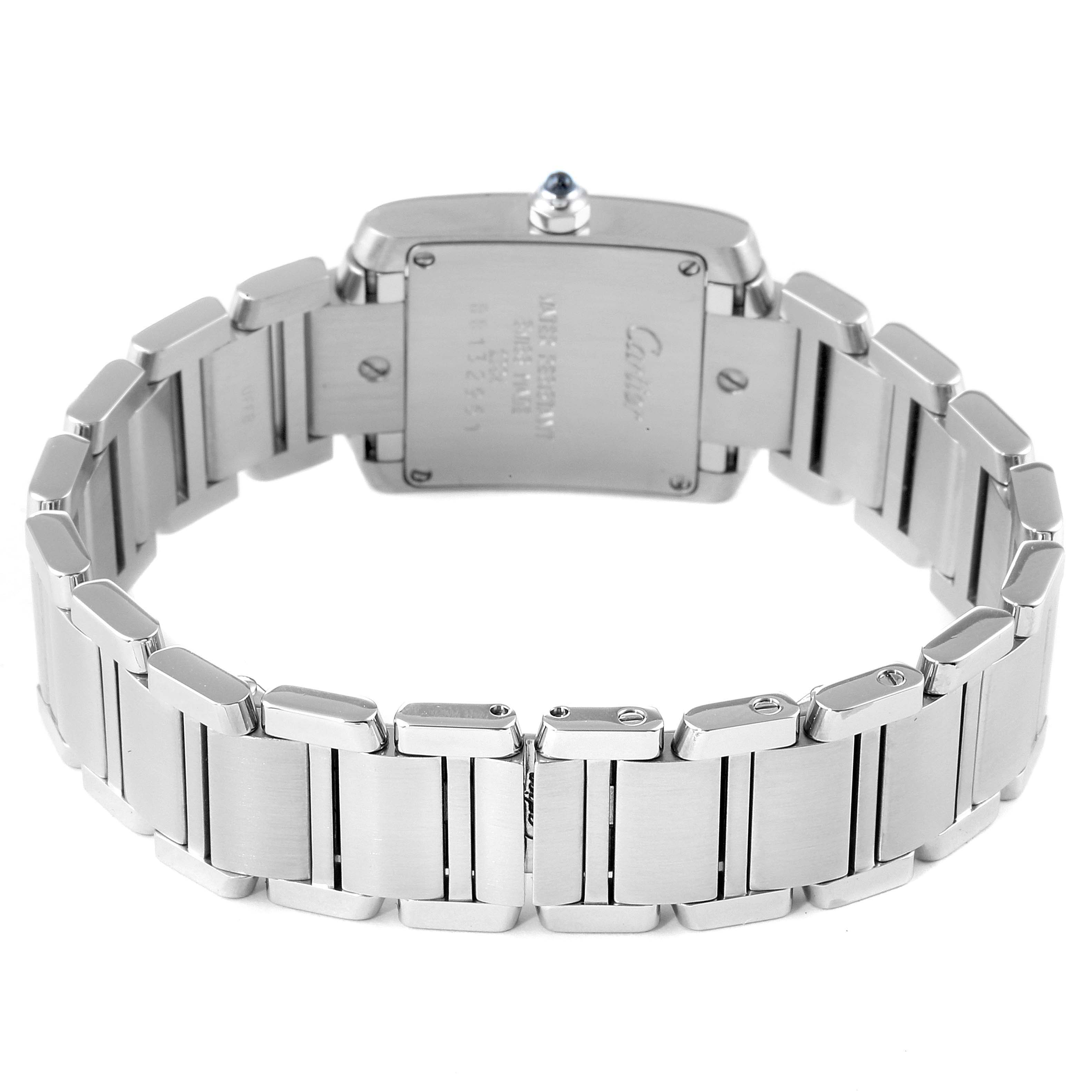 The image shows the back and bracelet of a Cartier Tank Française watch at a rear angle.
