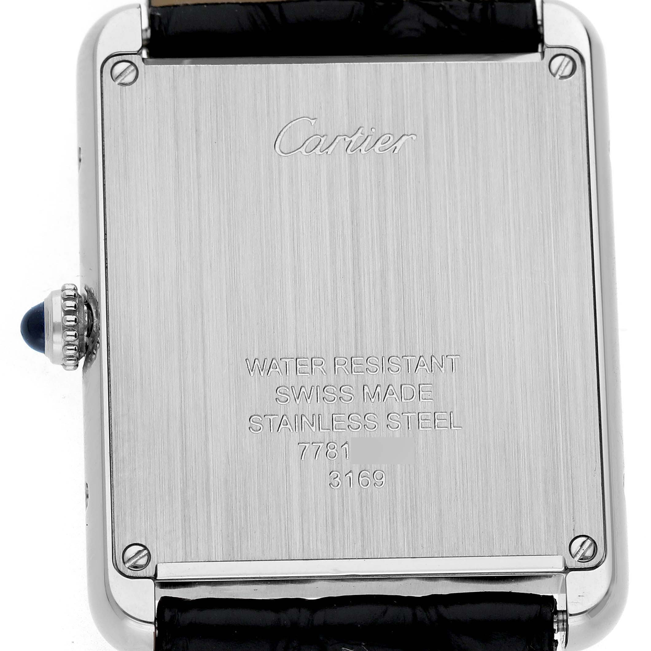The image shows the back of a Cartier Tank Solo W5200003 Men's Stainless Steel Silver Dial watch, featuring the case back and crown with a cabochon.