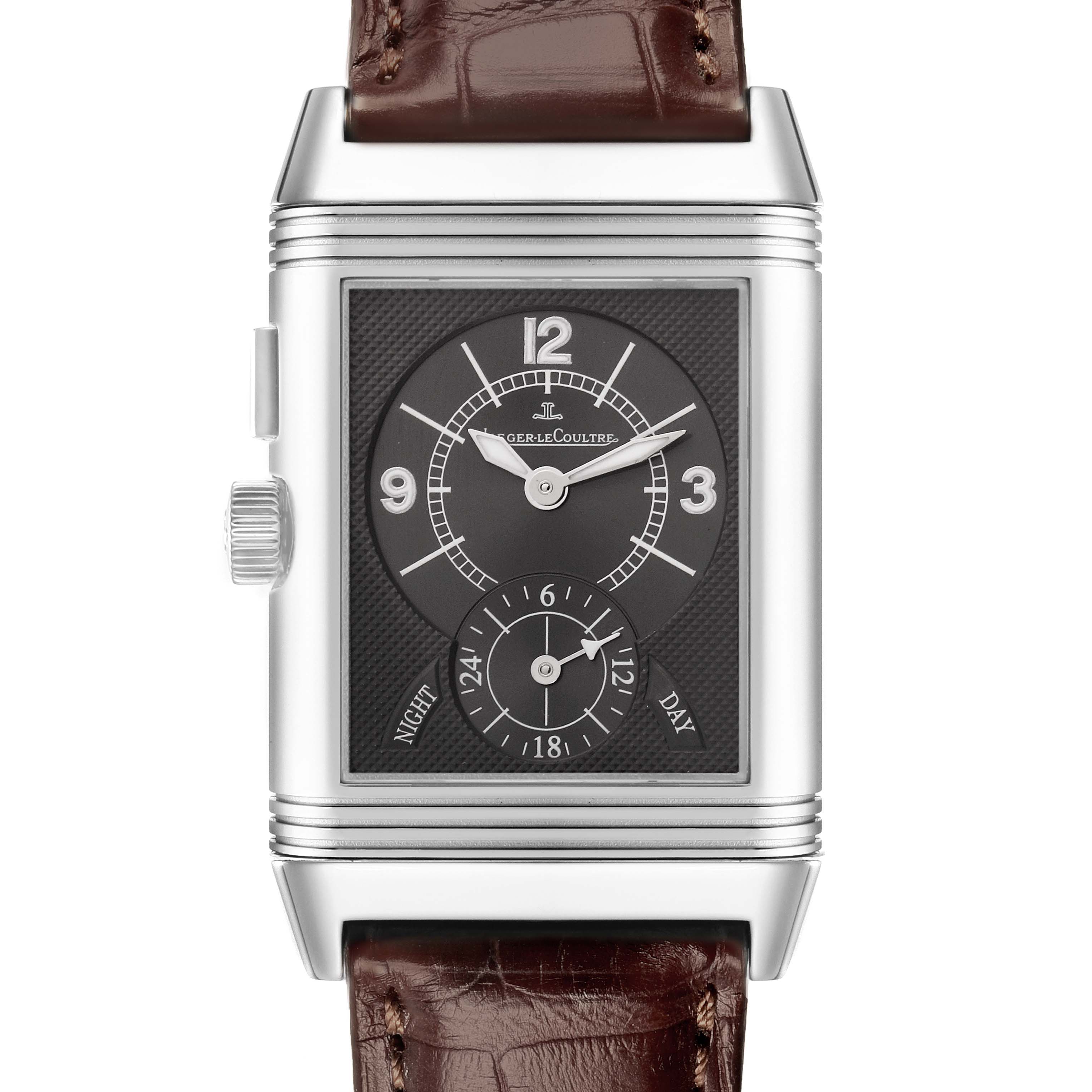 The image shows a front view of a Jaeger-LeCoultre Reverso watch, highlighting the dial, case, and crown.