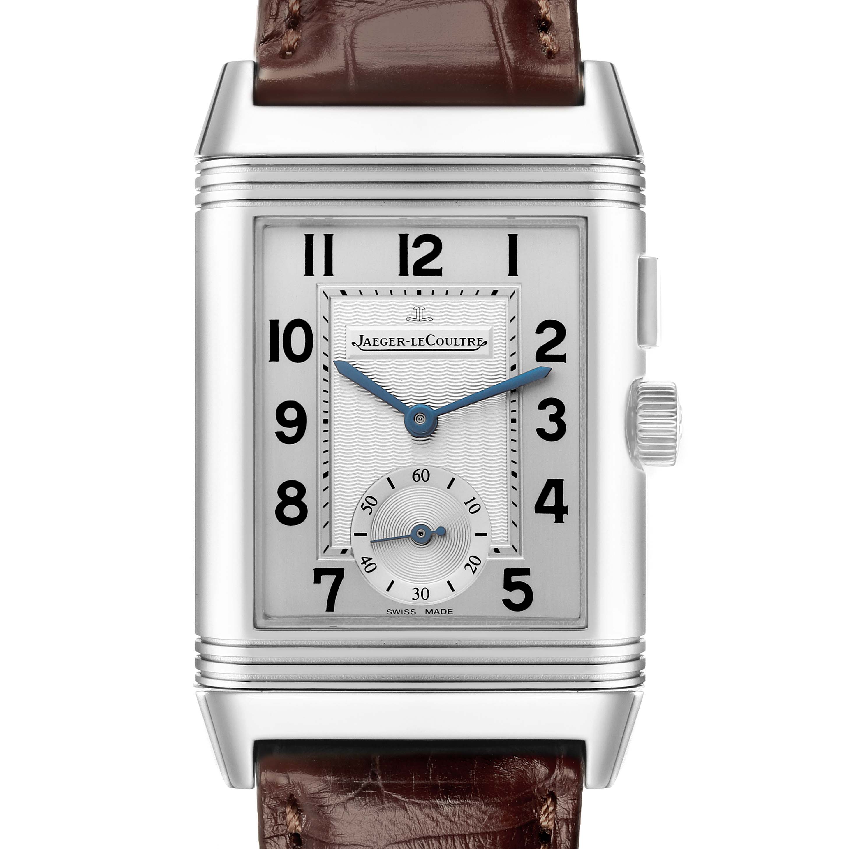The Jaeger-LeCoultre Reverso watch is shown from the front, featuring its rectangular dial with numerals and a sub-dial.