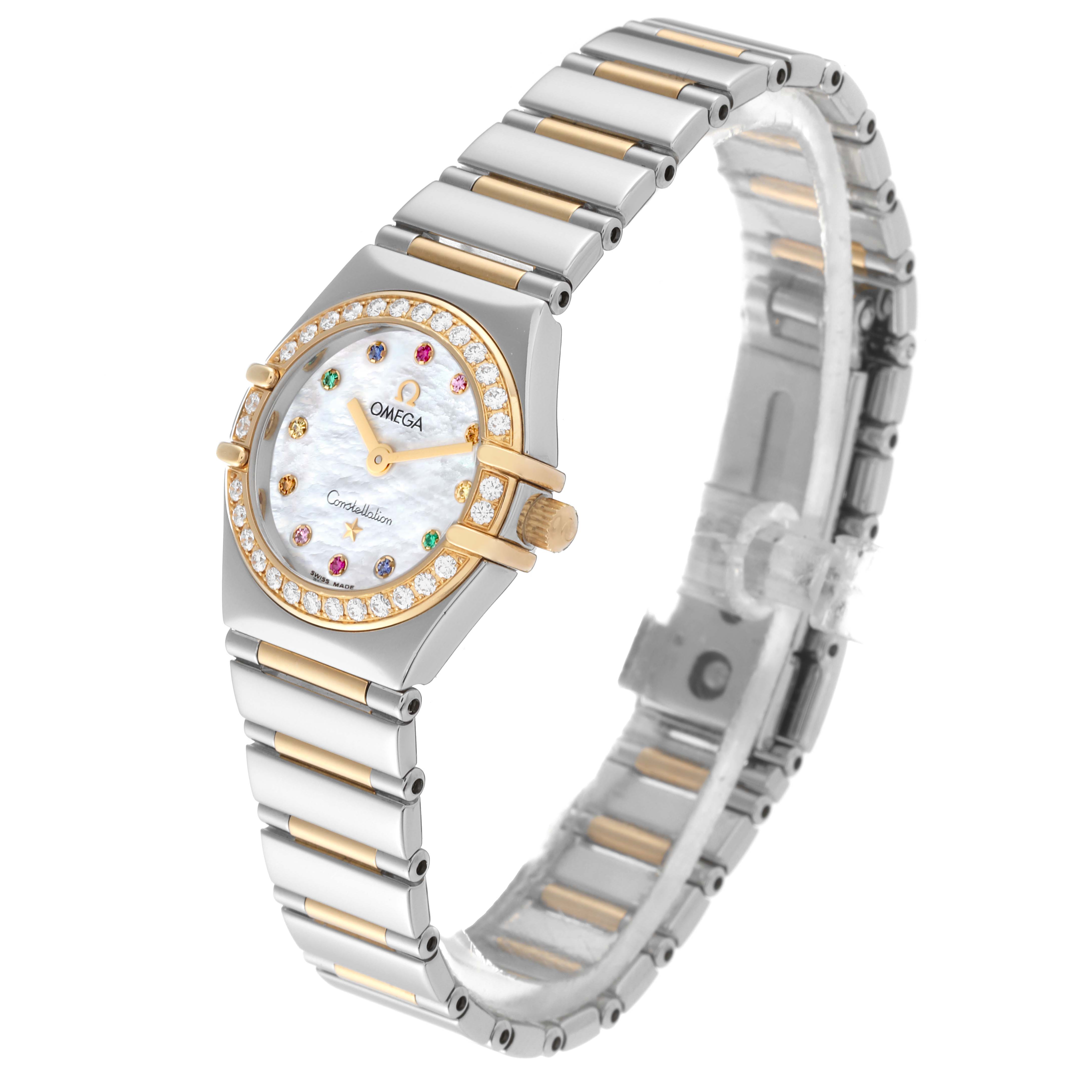 The Omega 1365.79.00 Women's Steel and Gold (two tone) Mother of Pearl Dial 1365.79.00 Women's Steel and Gold (two tone) Mother of Pearl Dial Constellation Iris Rainbow Steel Yellow Gold Multi Stone Ladies Watch 1365.79.00 is shown from a 3/4 angle highlighting its face and bracelet.