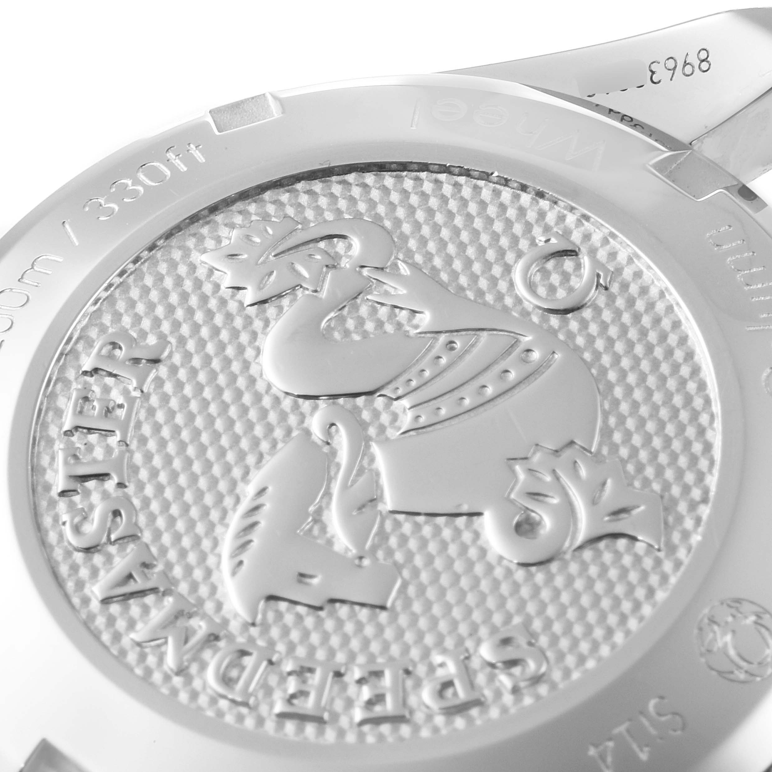 The image shows the case back of an Omega Speedmaster 324.30.38.50.02.001 Men
s Stainless Steel Silver Dial 324.30.38.50.02.001 Men
s Stainless Steel Silver Dial watch, highlighting its engraved details and water resistance.