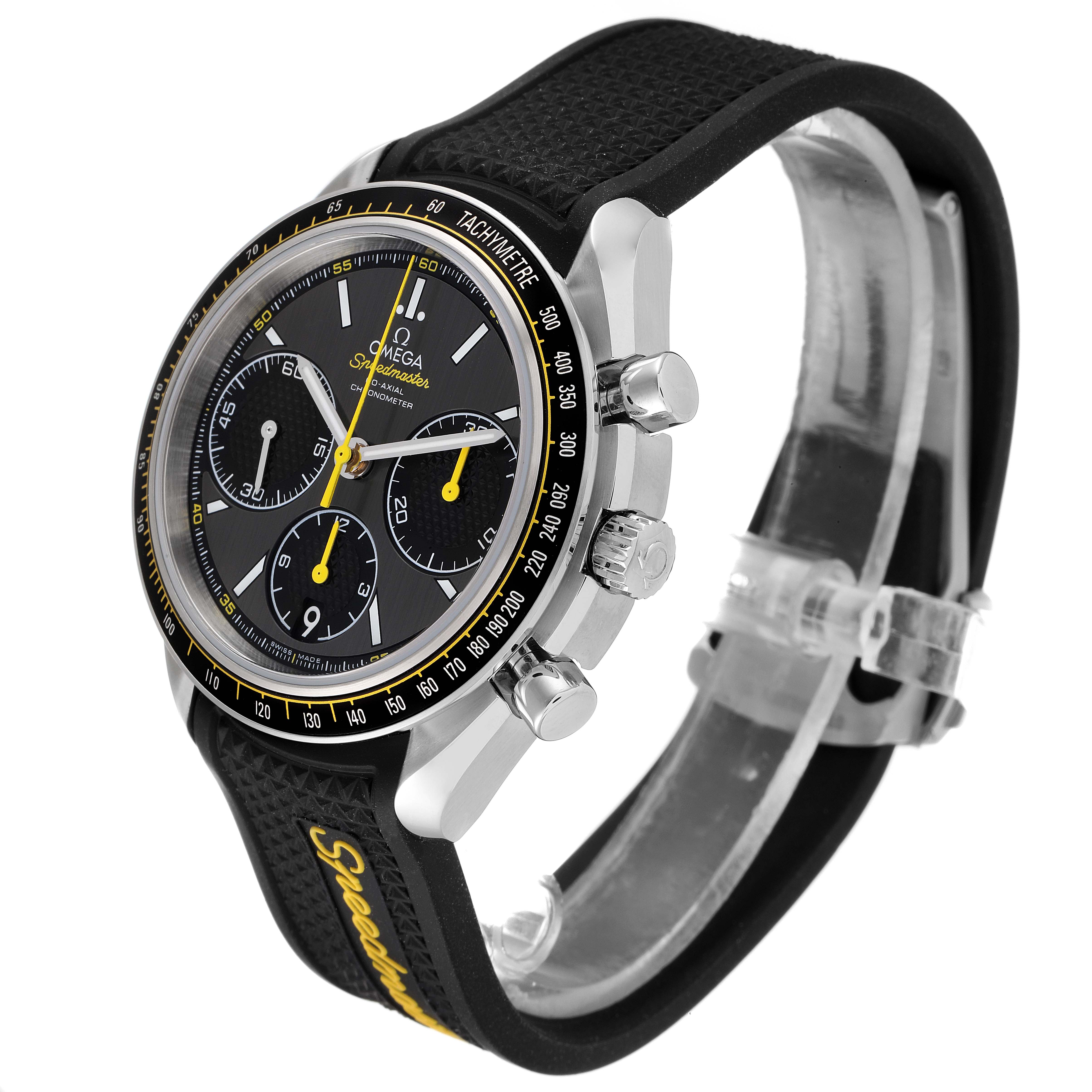 The image shows an Omega Speedmaster 326.32.40.50.06.001 Men's Stainless Steel Grey Dial 326.32.40.50.06.001 Men's Stainless Steel Grey Dial watch at a 3/4 angle, highlighting its black dial, chronograph subdials, and rubber strap.