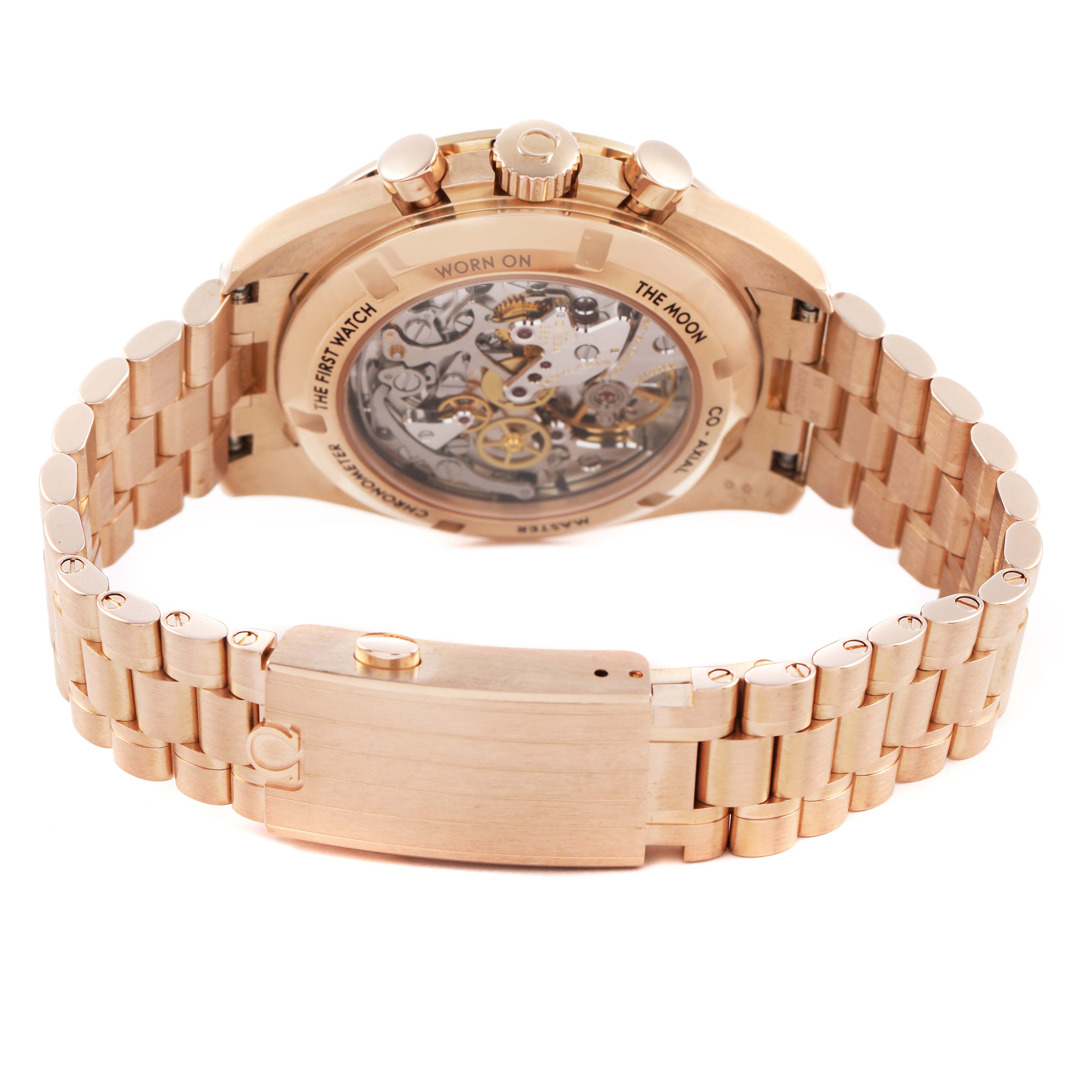 The image shows the back view of an Omega Speedmaster 310.60.42.50.01.001 Men's Rose Gold Black Dial watch, highlighting the transparent case back, bracelet, and clasp.