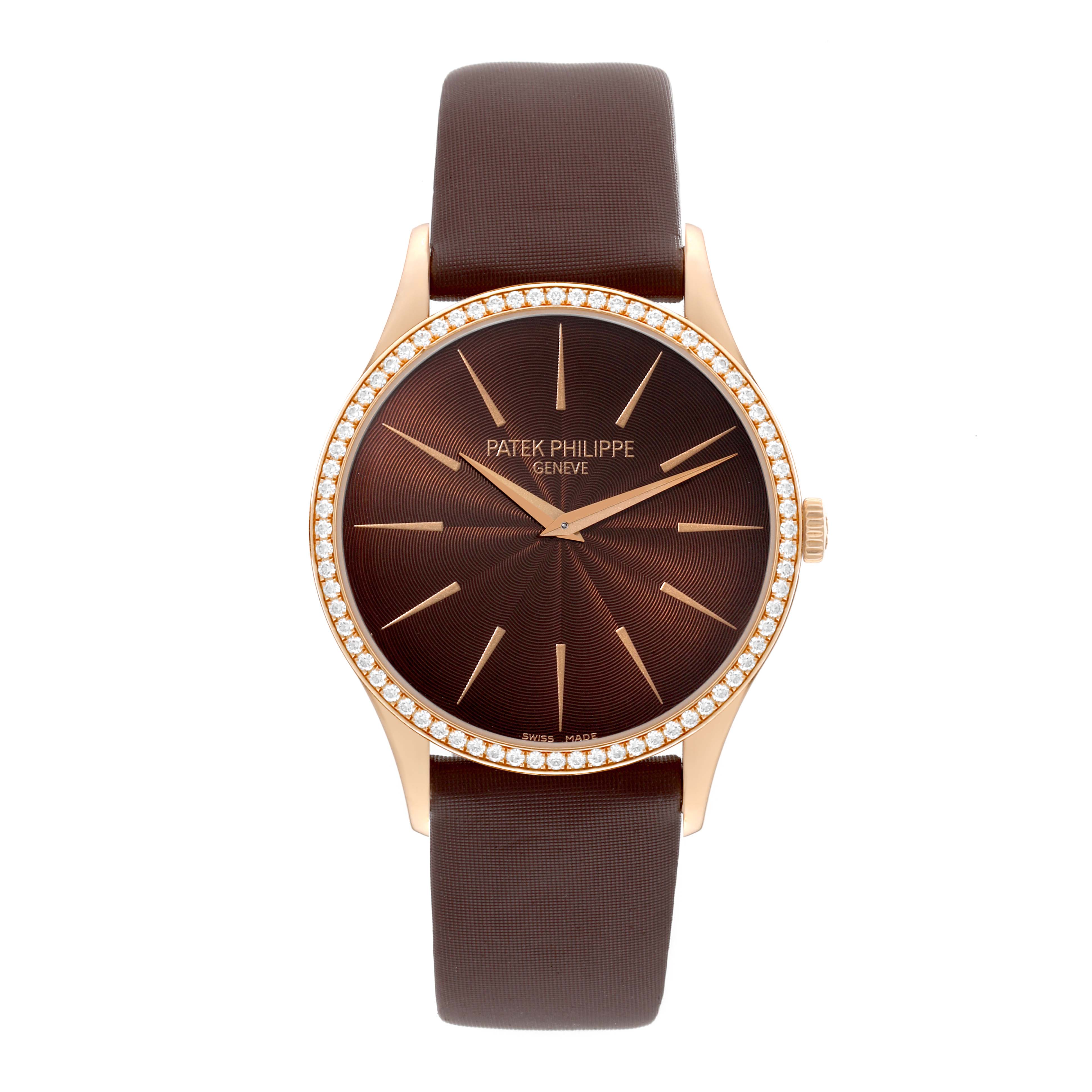 The image shows a front view of a Patek Philippe Calatrava 4897R-001 Women's Rose Gold Brown Dial 4897R-001 Women's Rose Gold Brown Dial model, featuring a brown dial, diamond-set bezel, and brown strap.