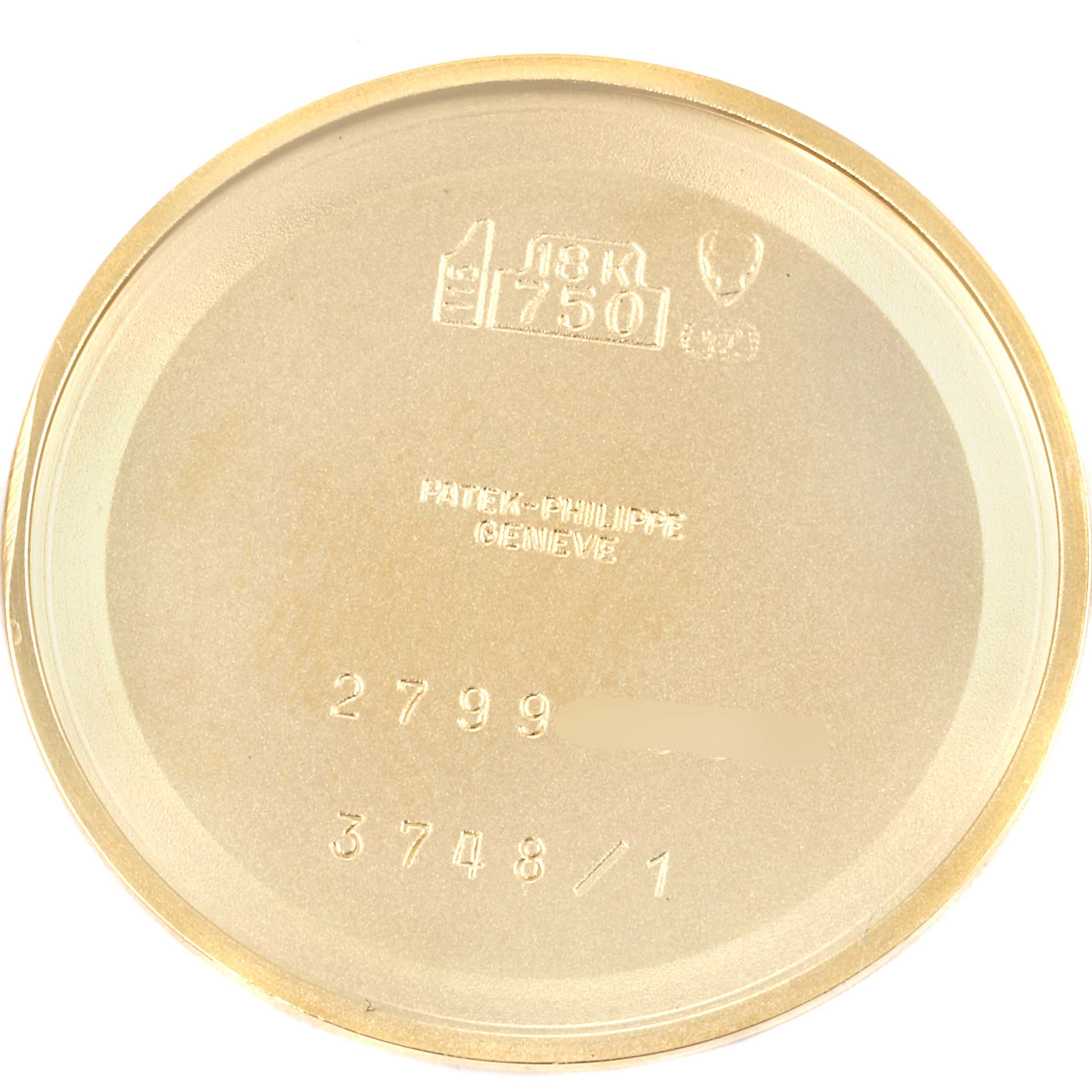 This image shows the inner case back of a Patek Philippe Golden Ellipse 3748/1 Men's Yellow Gold Blue Dial 3748/1 Men's Yellow Gold Blue Dial watch, featuring the hallmark and model numbers.