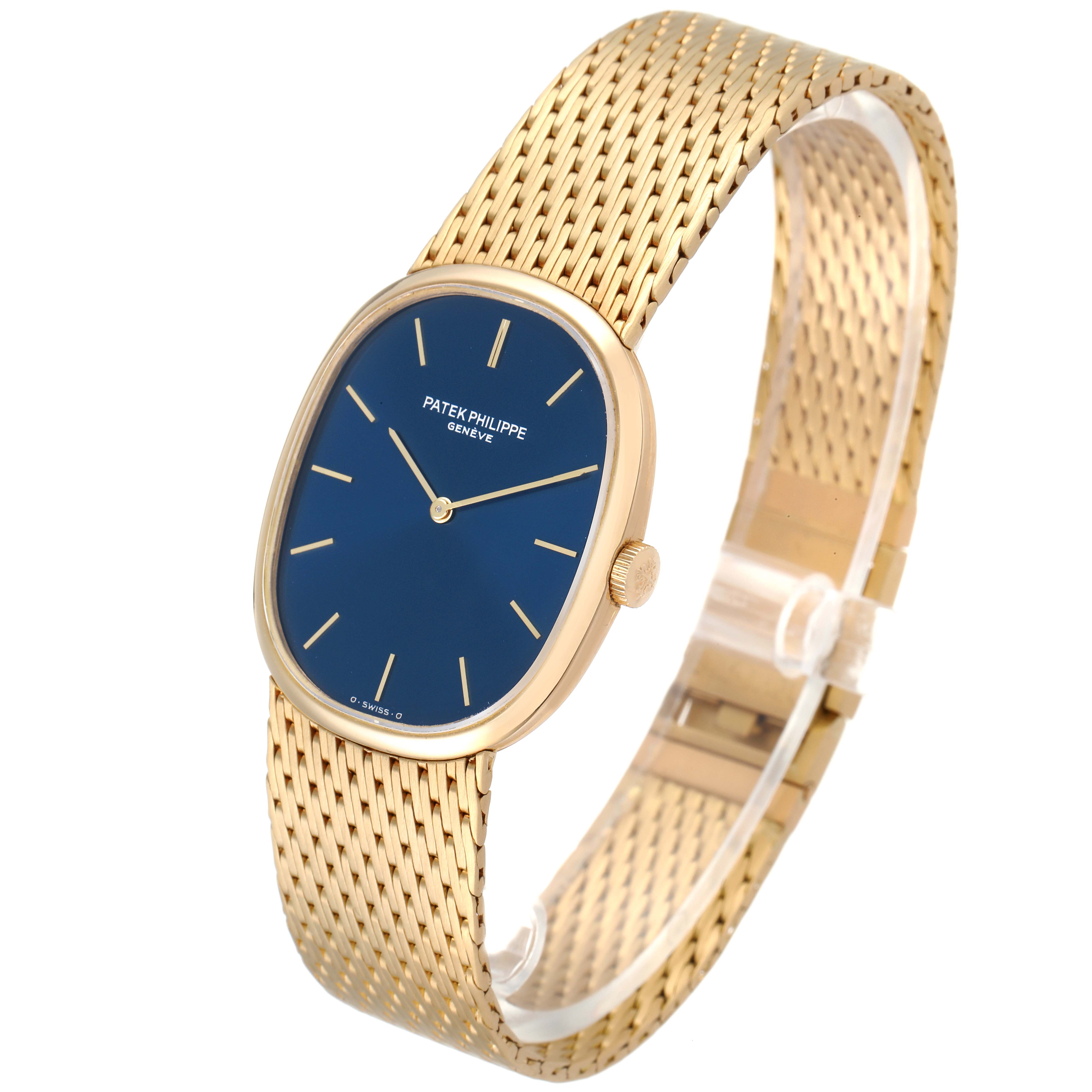 This image shows a three-quarter angle view of the Patek Philippe Golden Ellipse 3748/1 Men's Yellow Gold Blue Dial 3748/1 Men's Yellow Gold Blue Dial watch, highlighting its face, case, and gold bracelet.