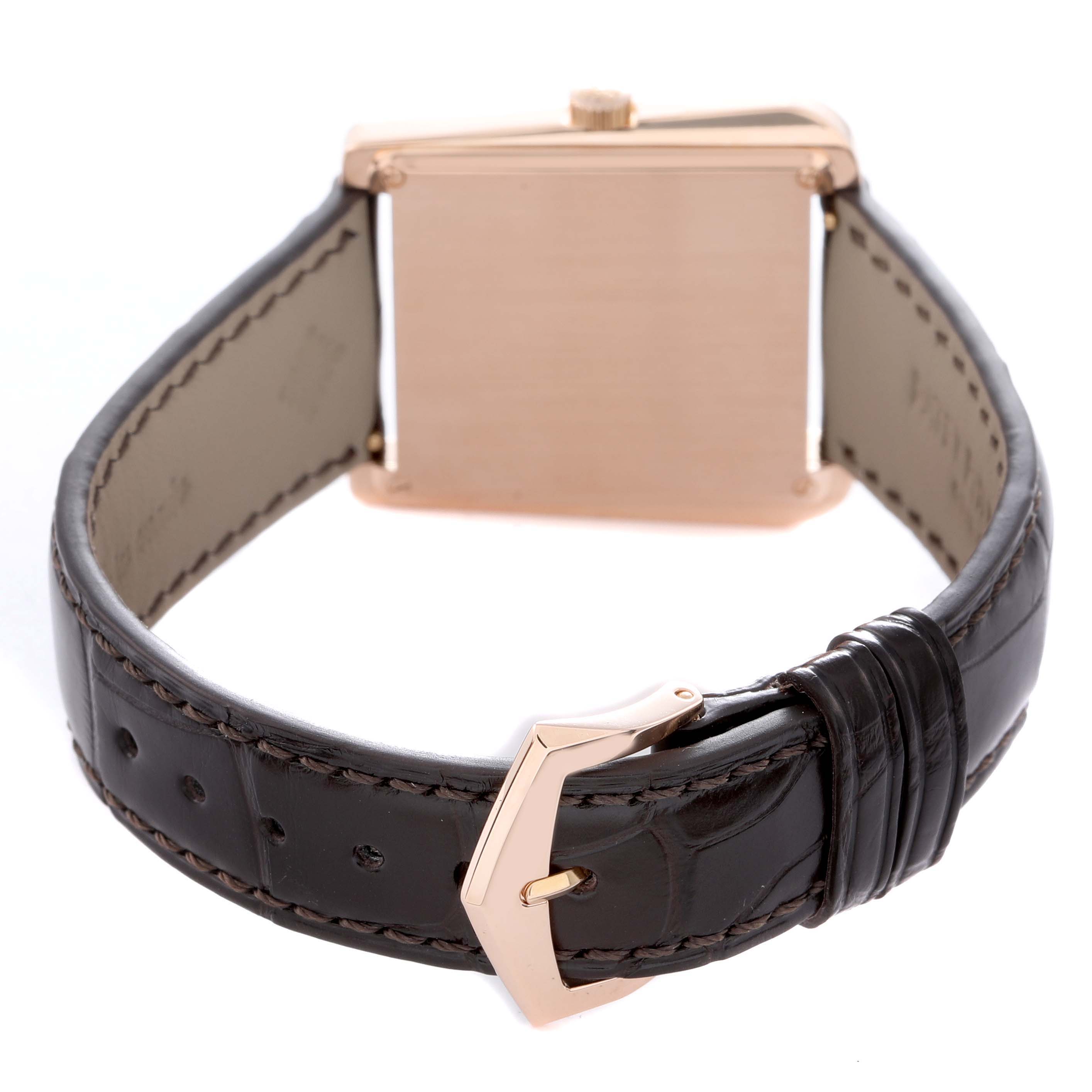 The Patek Philippe Gondolo 5489R Men
s Rose Gold Silver Dial 5489R Men
s Rose Gold Silver Dial watch is shown from a rear angle, highlighting the case back and brown leather strap with a rose gold buckle.